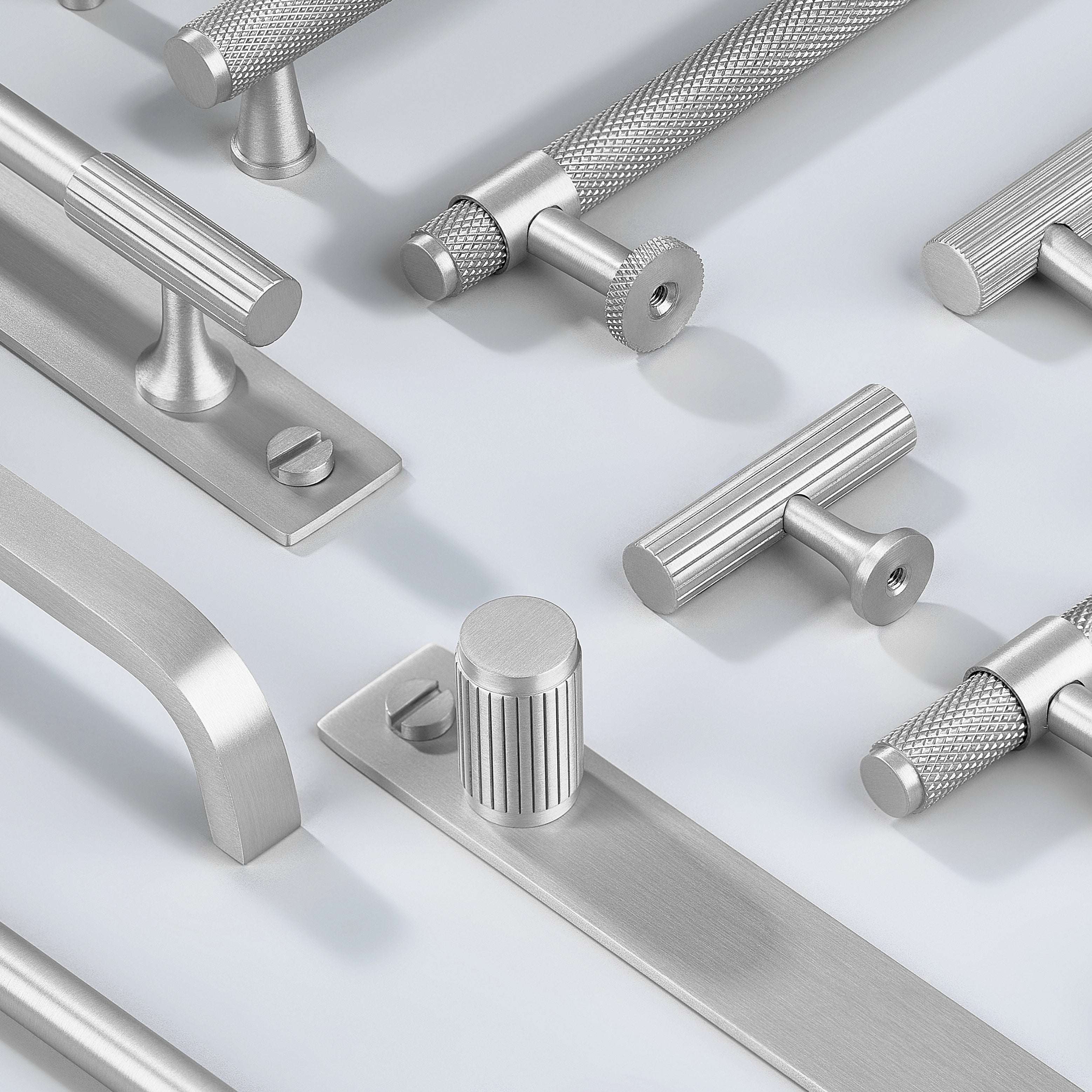 Cabinet Handles in diamond knurling, linear knurling, curve shape with and without back-plate in silver finish. Cabinet Knob in diamond knurling, linear knurling, T shape, cylindrical shape with and without back-plate in silver finish