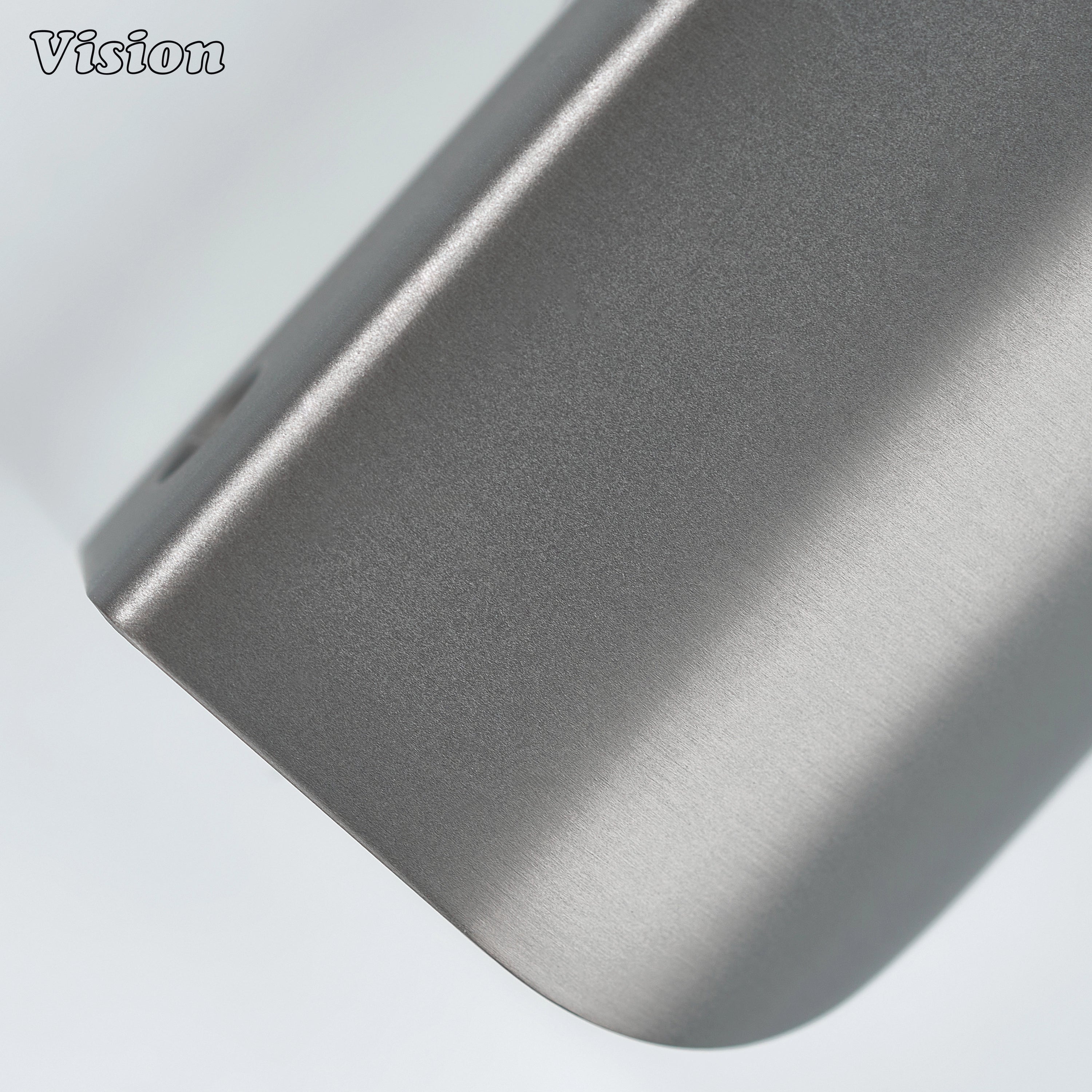 Smooth plain curve cabinet pull in gunmetal finish with round profile for contemporary cabinetry.