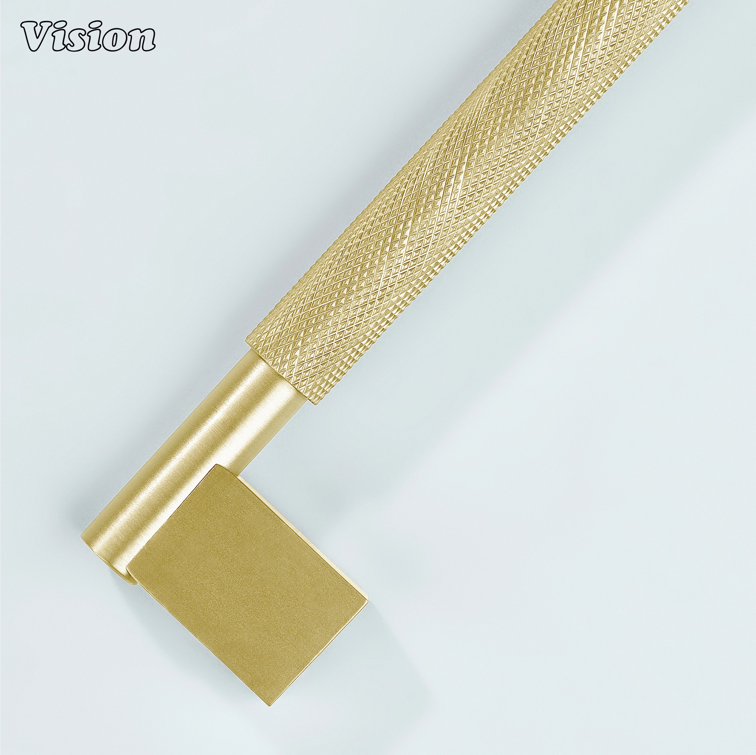 Gold Kronos knurled handle mounted on dresser drawers