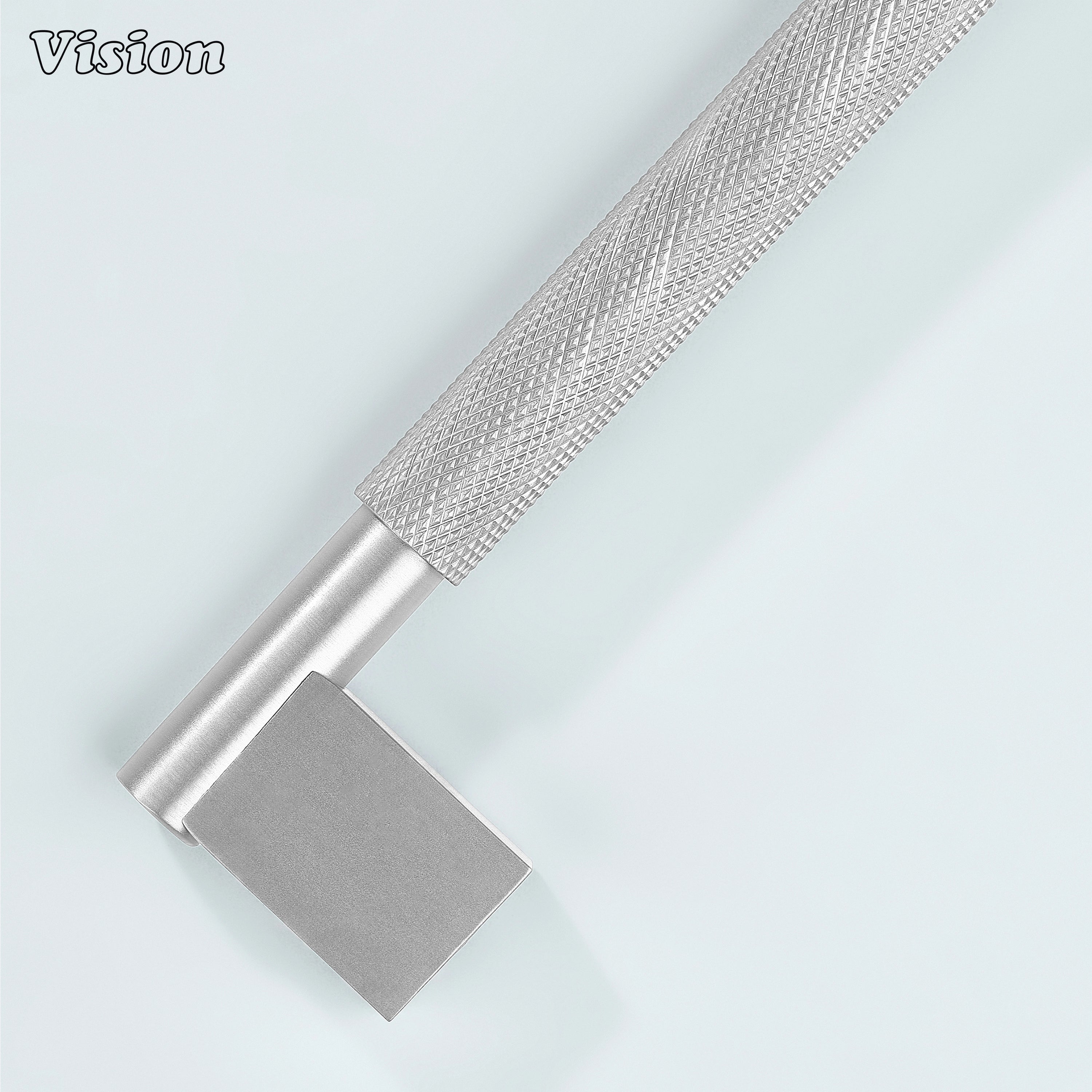 Silver Kronos knurled handle mounted on dresser drawers