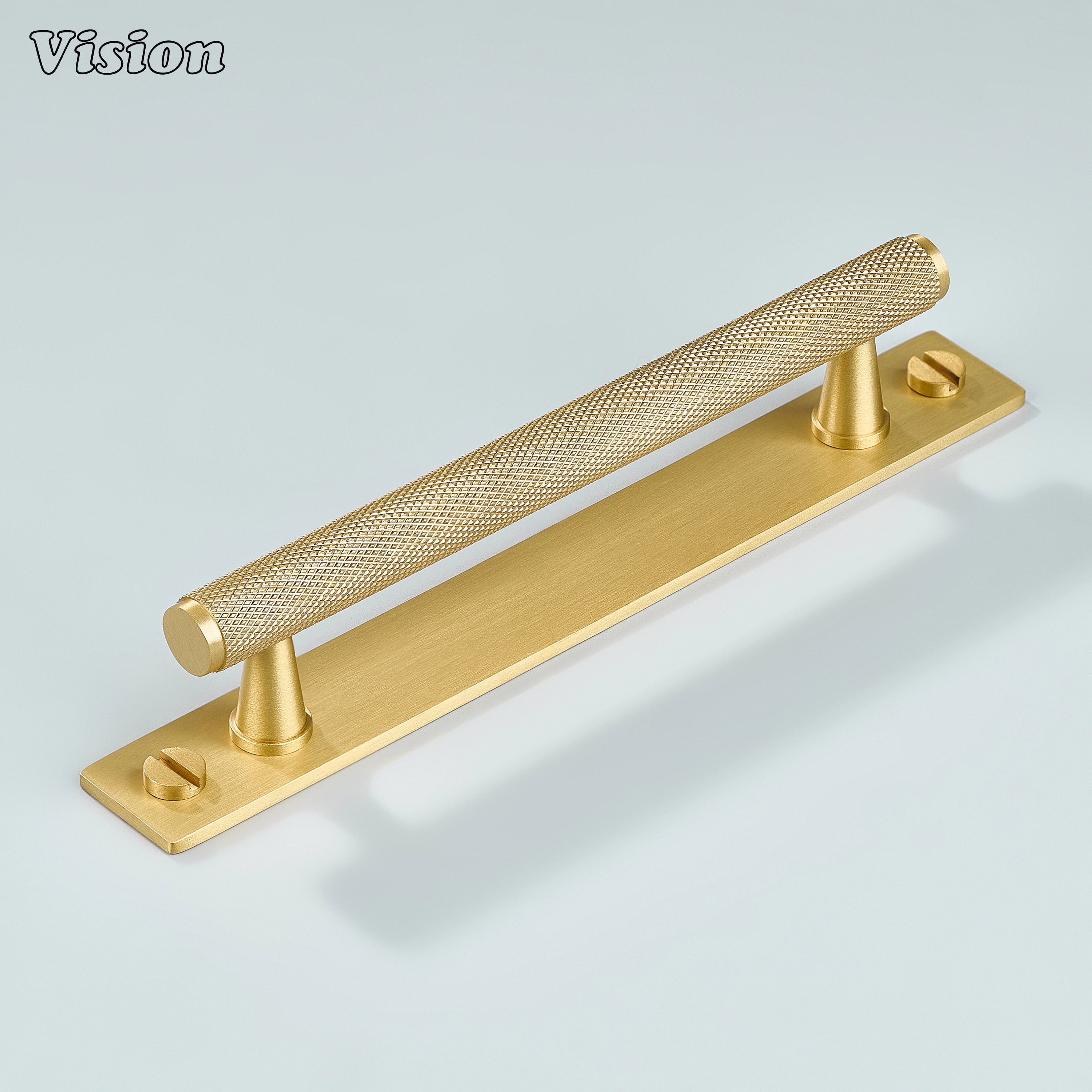 Gold finish knurled cabinet handle showing bar design on cabinet doors
