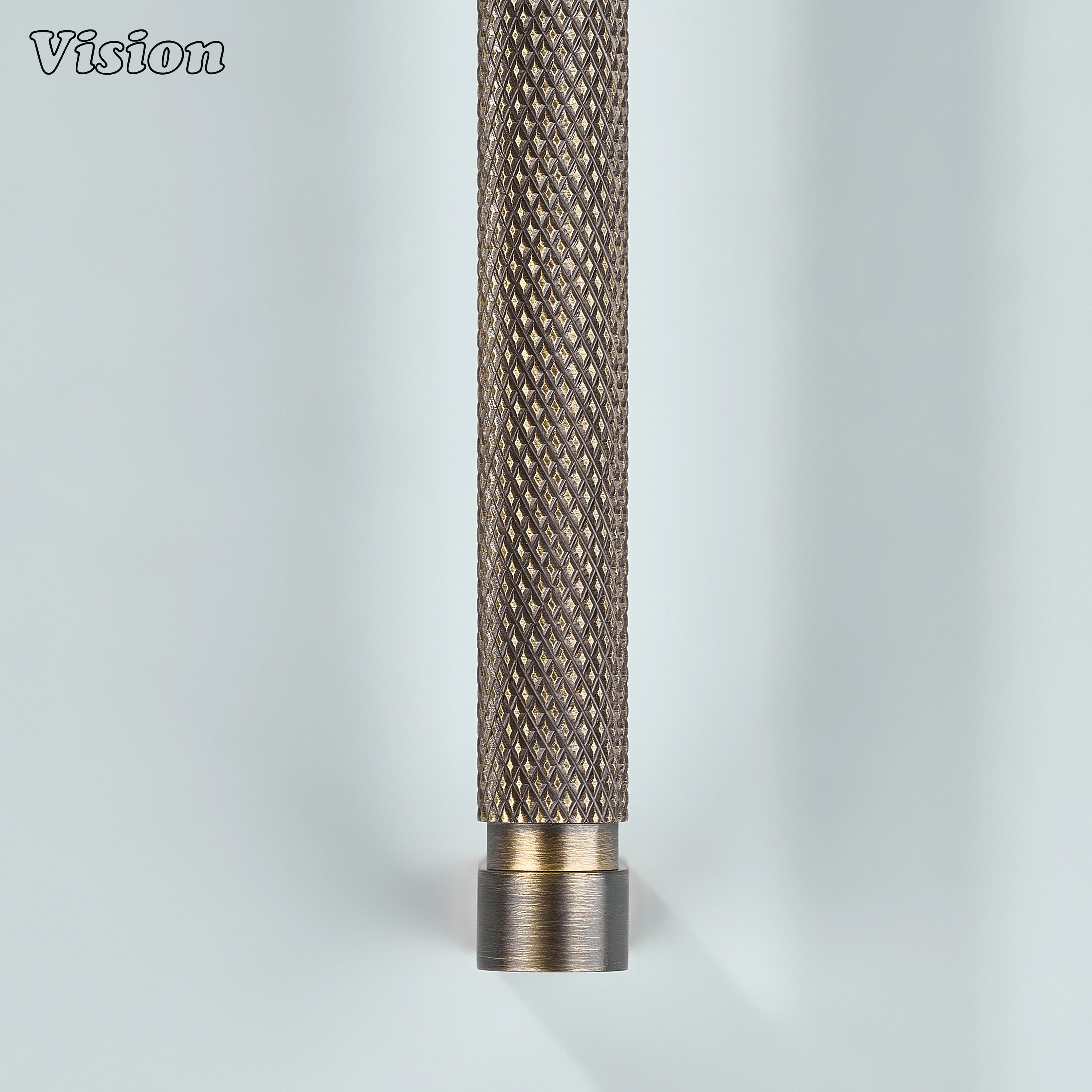 Antique bronze ripple knurled cabinet handle mounted on modular kitchen units.