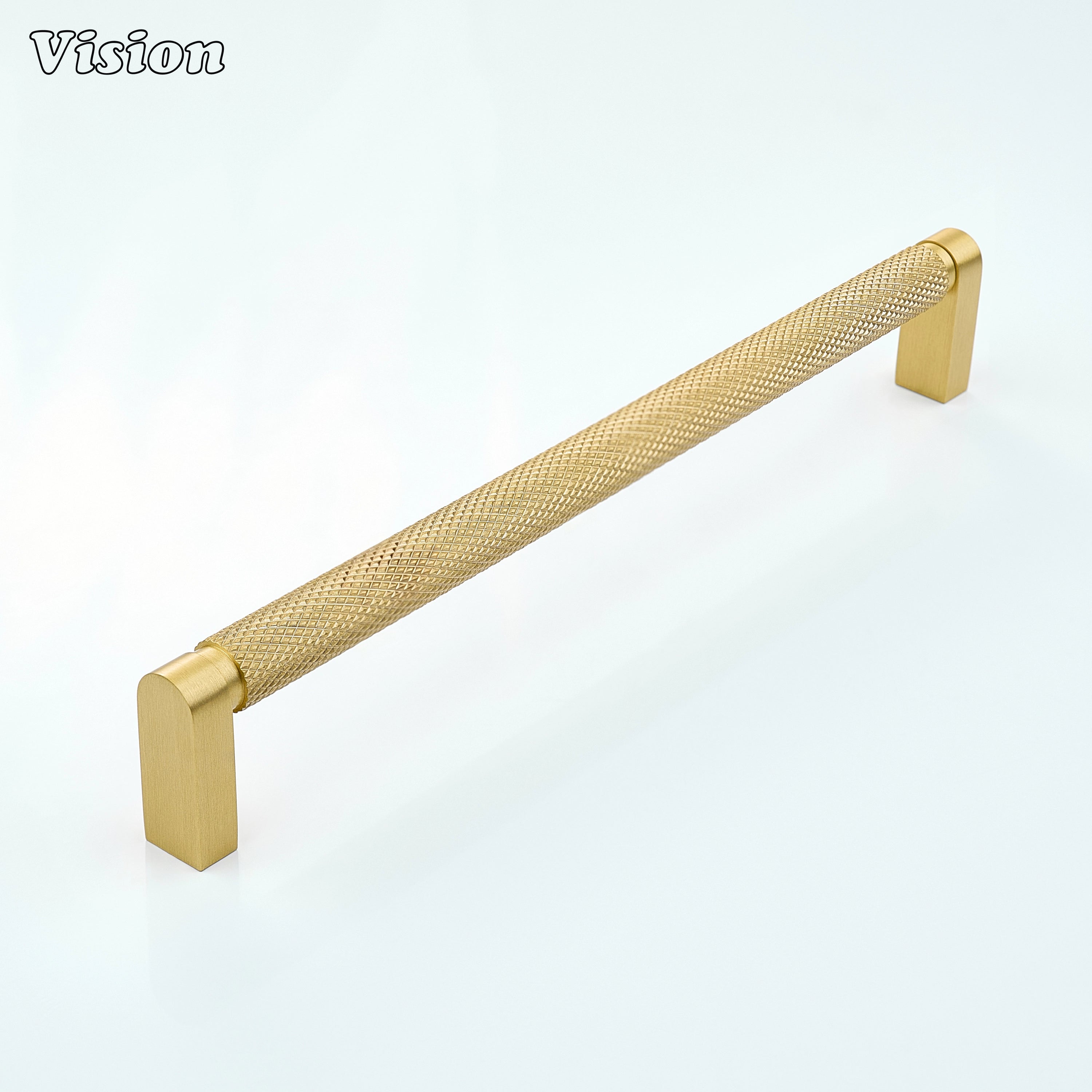 Gold ripple knurled cabinet handle fitted on dresser drawers.