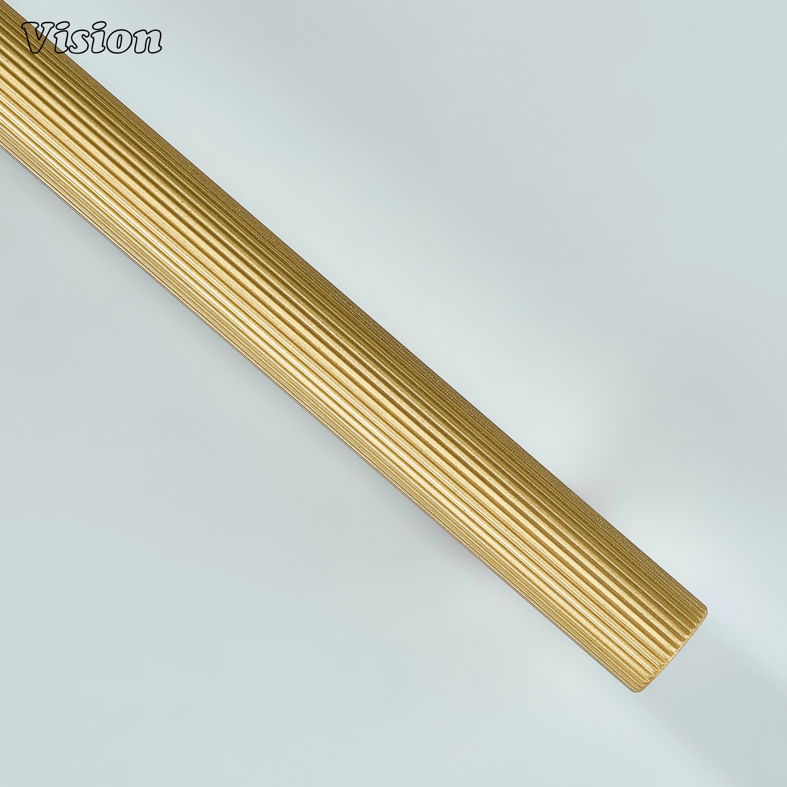 Gold linear knurled cabinet pull with textured bar profile for living room cabinets.