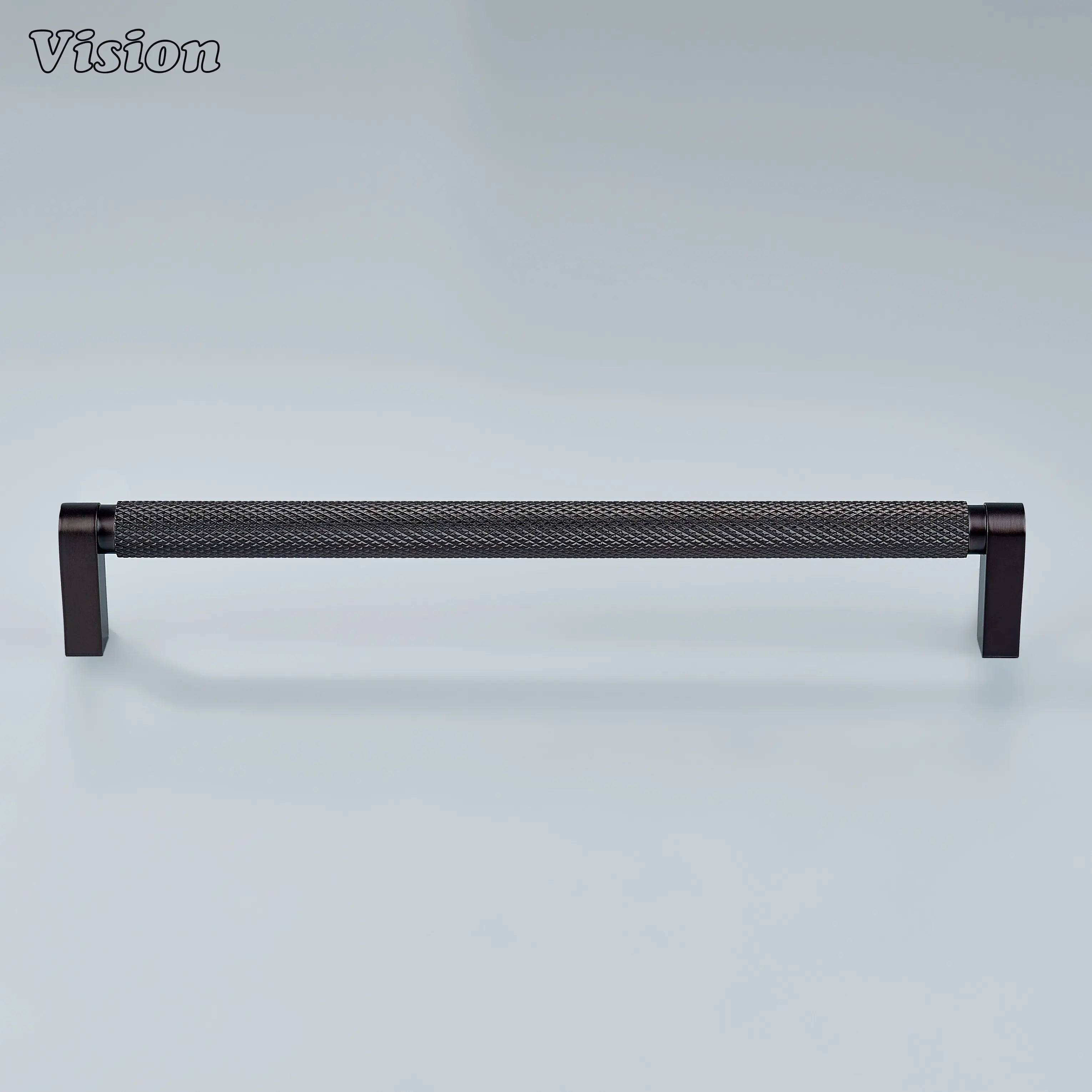 Modern oil rubbed bronze ripple knurled handle used for cupboards.