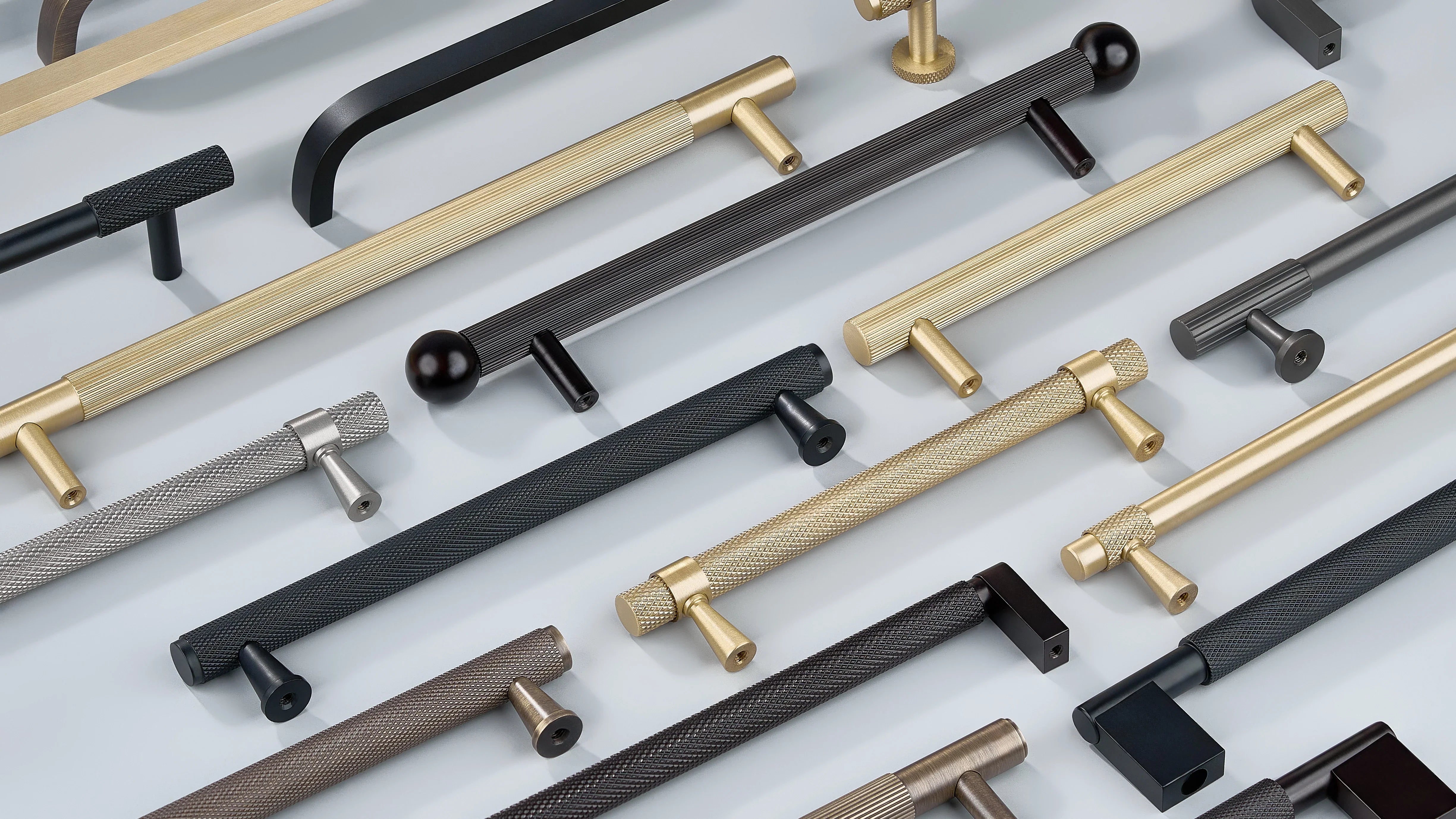 Cabinet Handles in diamond knurling, linear knurling and curve without knurling in oil rubbed bronze, antique bronze, gold, silver and black finishes.