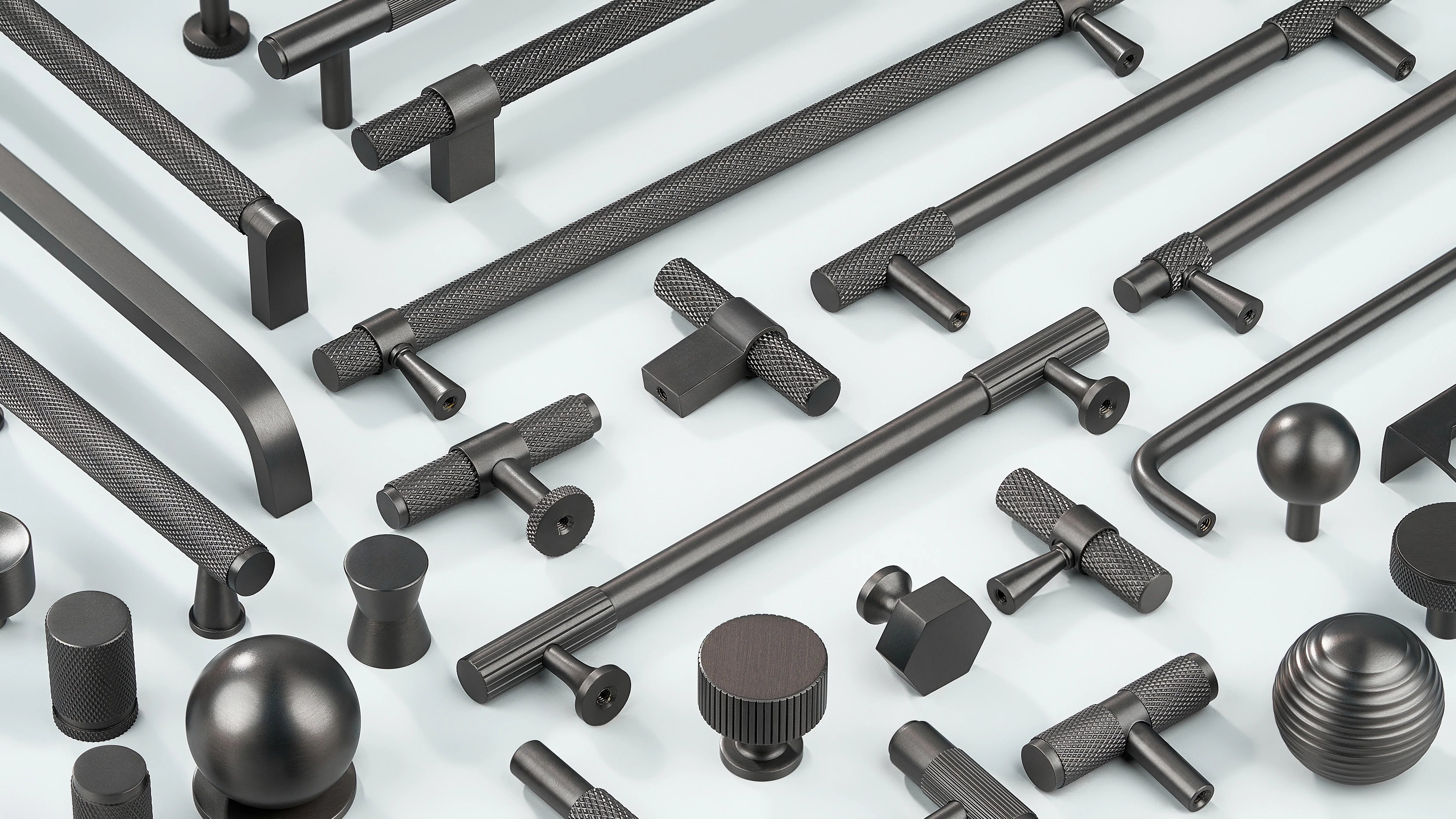 Cabinet handles in diamond knurling, linear knurling and curve shape along with Cabinet Knobs in T shape, sphere shape, round shape, hexagonal design and drum-like shape in gunmetal finish