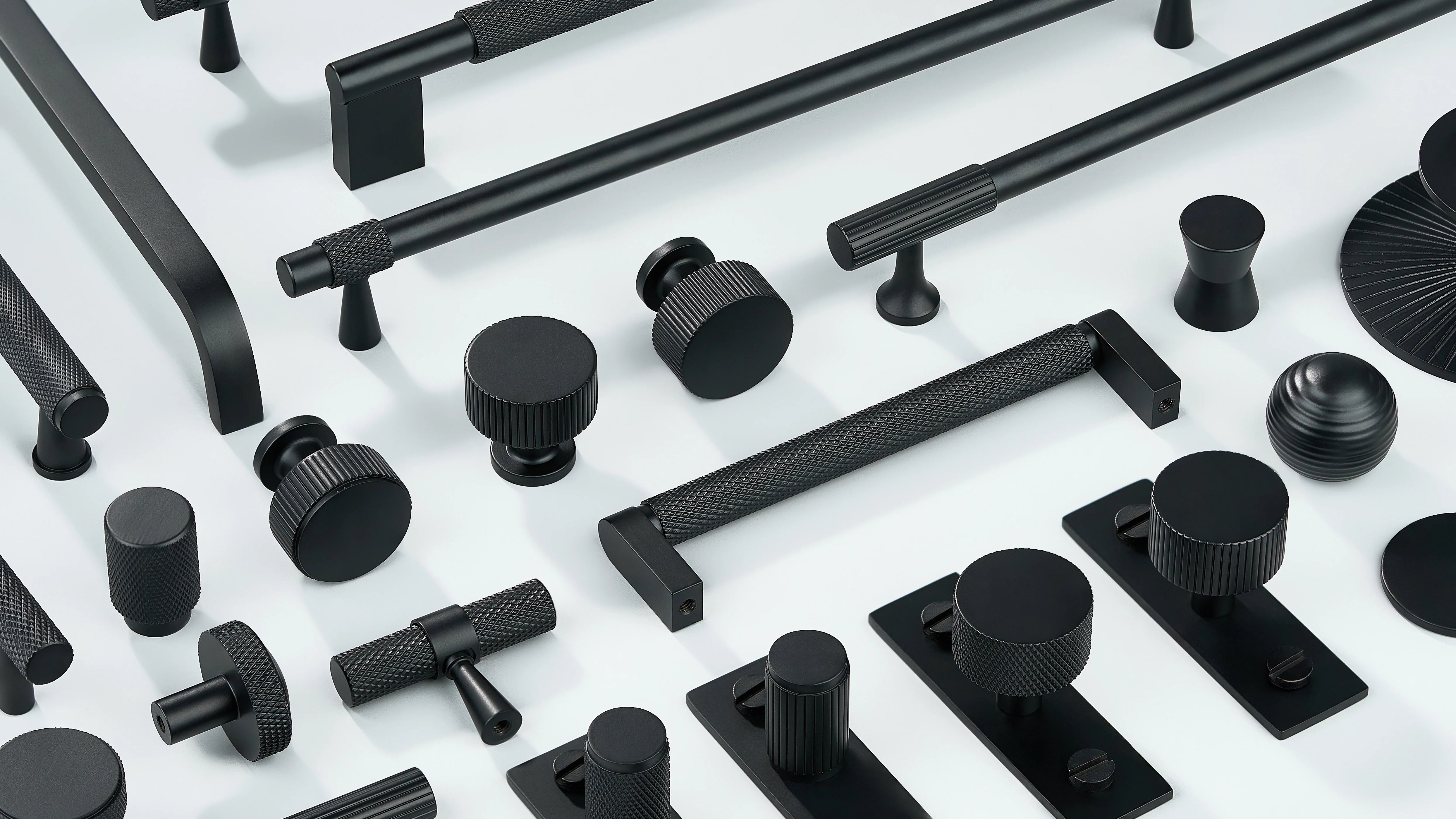 Cabinet handles in diamond knurling, linear knurling and curve shape along with cabinet knobs in round shape, sphere shape with or without back-plate in black finish