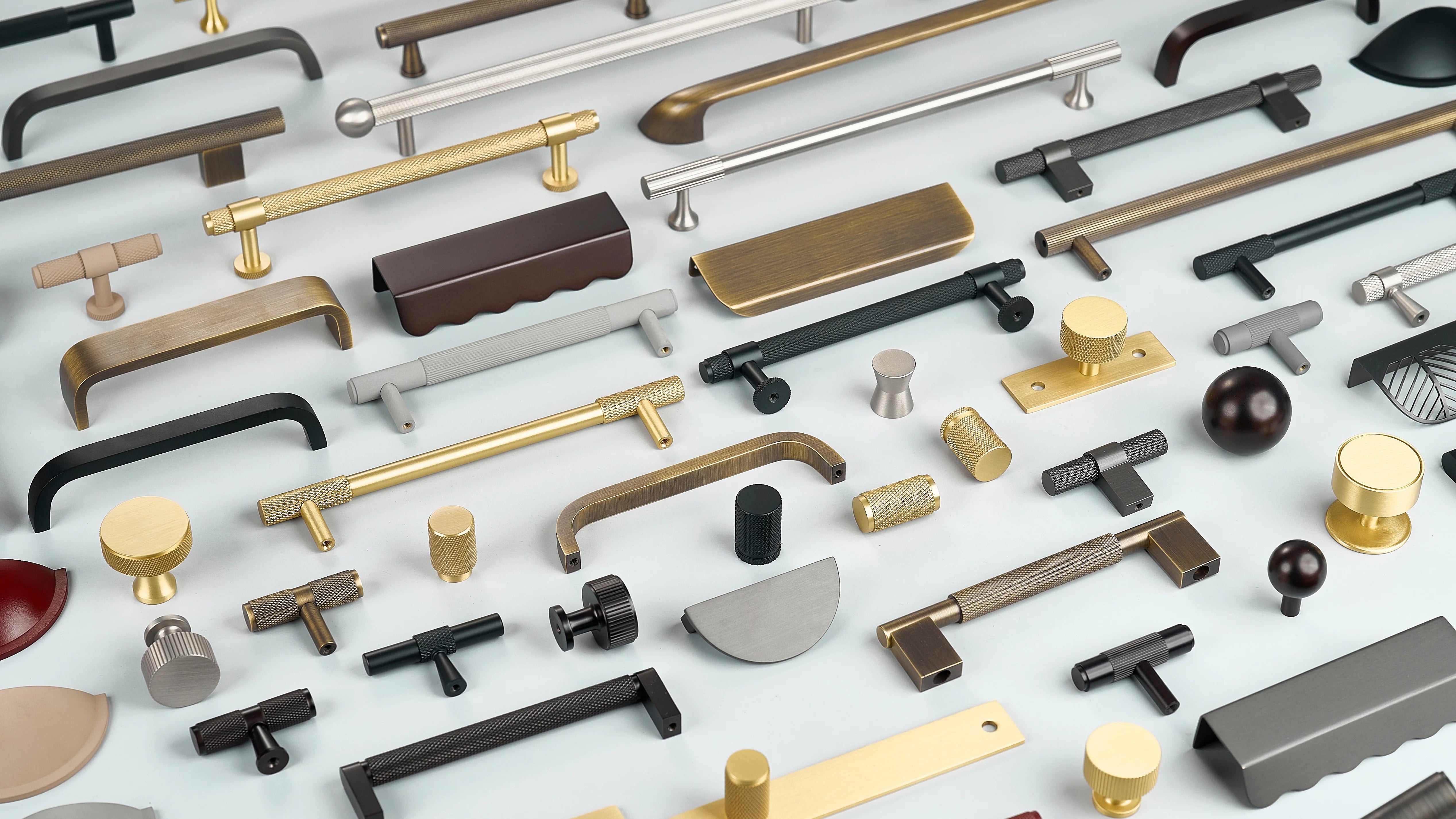 Cabinet handles in diamond, linear and curved designs in gold, antique bronze, gunmetal, oil-rubbed bronze, silver, black and umber green. Cabinet knobs in round and T shapes with or without plates. Lip pull handles in various profiles and added finishes.