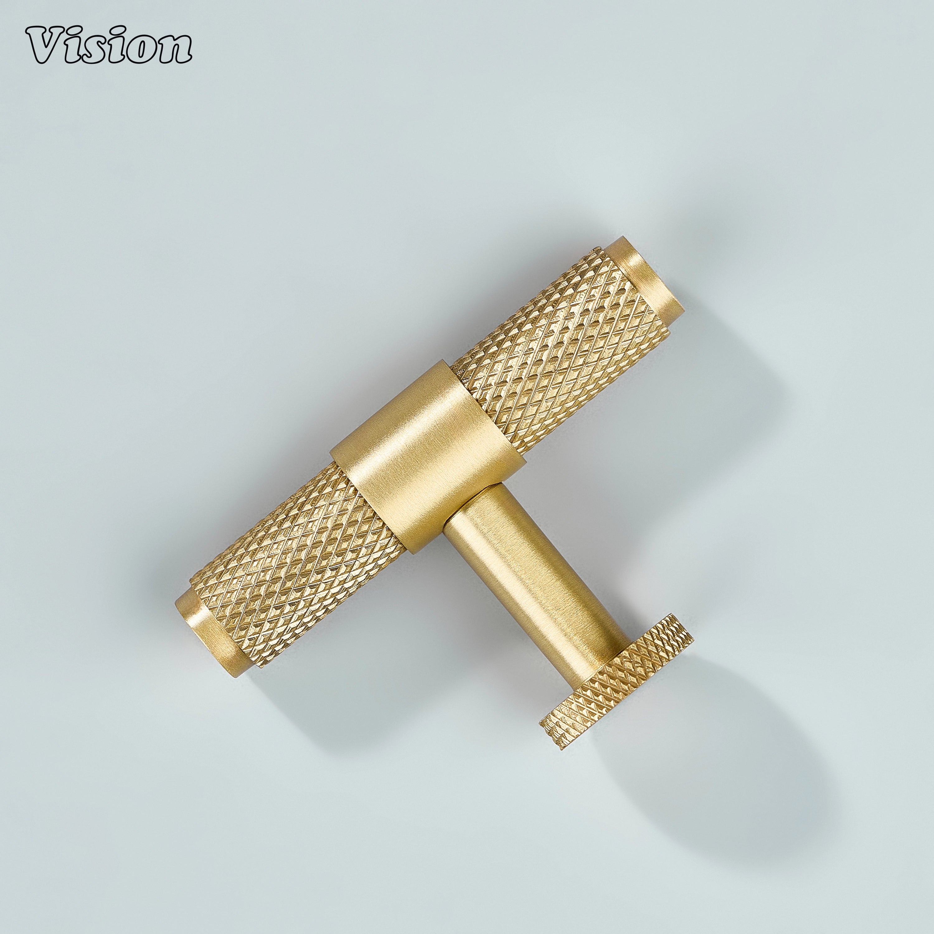 Gold knurled T-knob used for wardrobe doors and drawers.