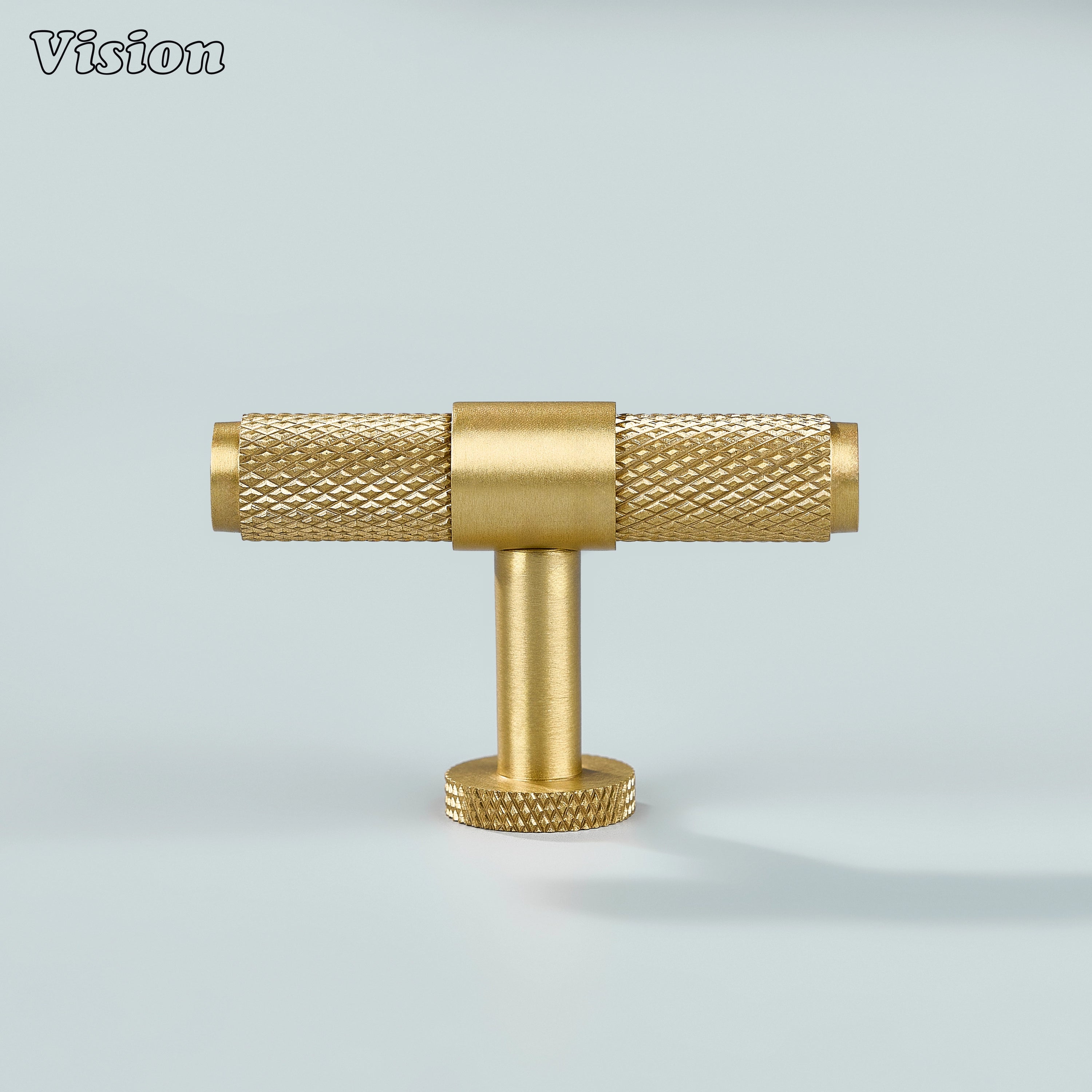 Sleek gold brass T-knob with ringed texture for cupboards.