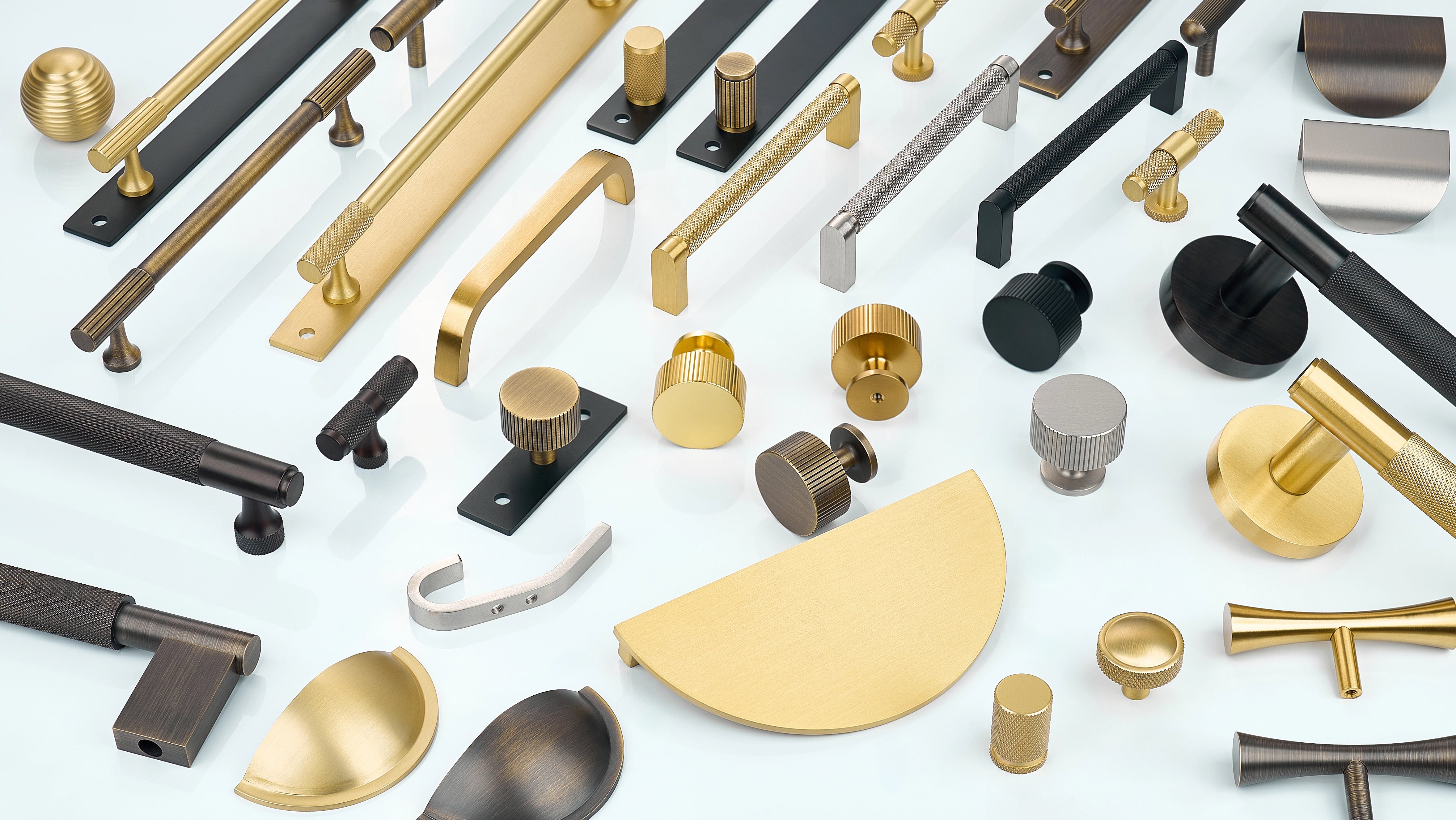 Cabinet Handles in diamond knurling, linear knurling and curve without knurling in oil rubbed bronze, antique bronze, gold, silver and black finishes. Cabinet knobs in diamond knurling, linear knurling with/without back-plate in oil rubbed bronze, antique bronze, gold, silver and black finishes. Cabinet Curved Profile Handles in oil rubbed bronze, antique bronze, gold, silver and black finishes. Wall Hook in Silver finish