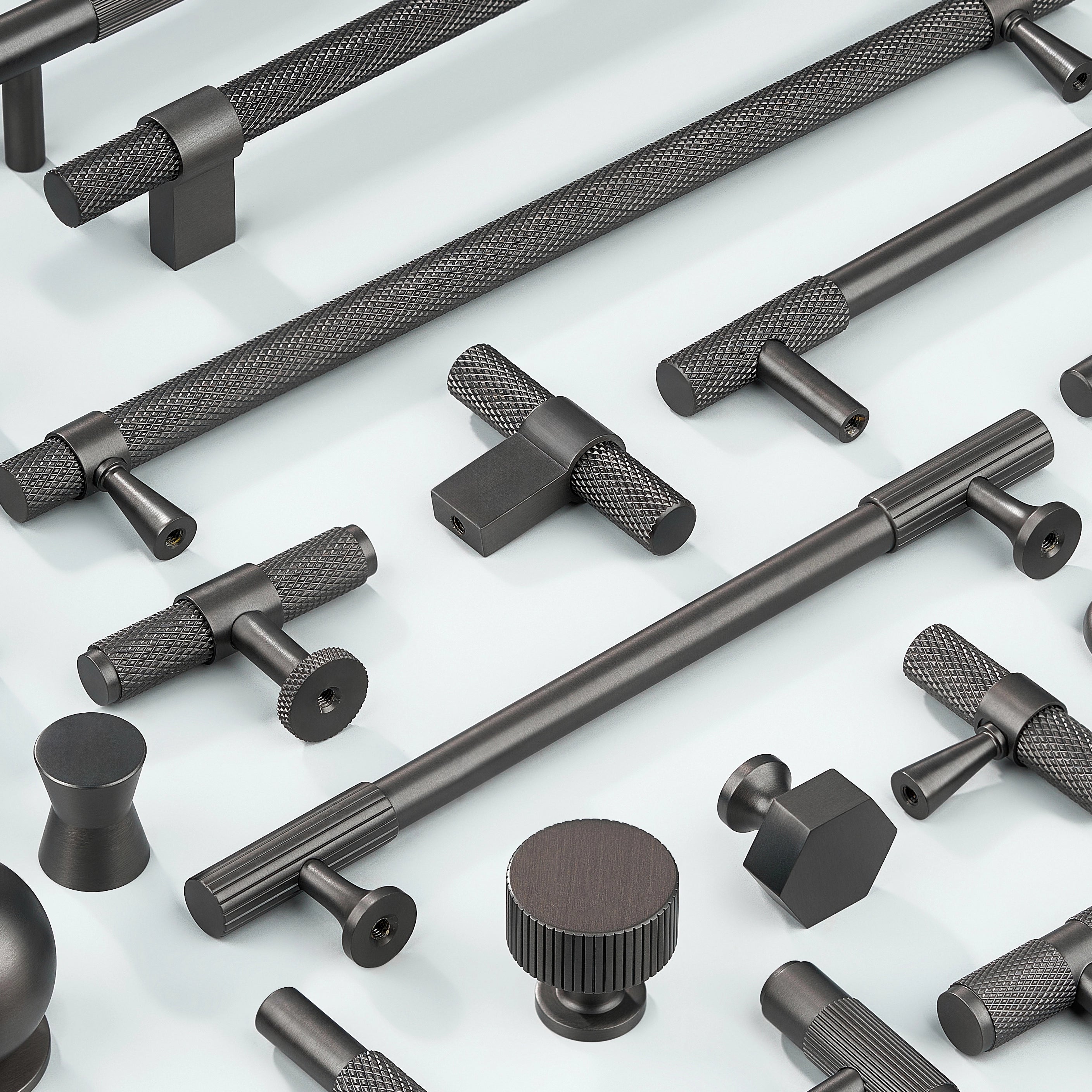 Cabinet Handles in diamond knurling, linear knurling, curve shape without knurling in gold finish. Cabinet Knobs in knurling, linear knurling, cylindrical shape, hexagonal shape, sphere shape, T shape in gunmetal finish