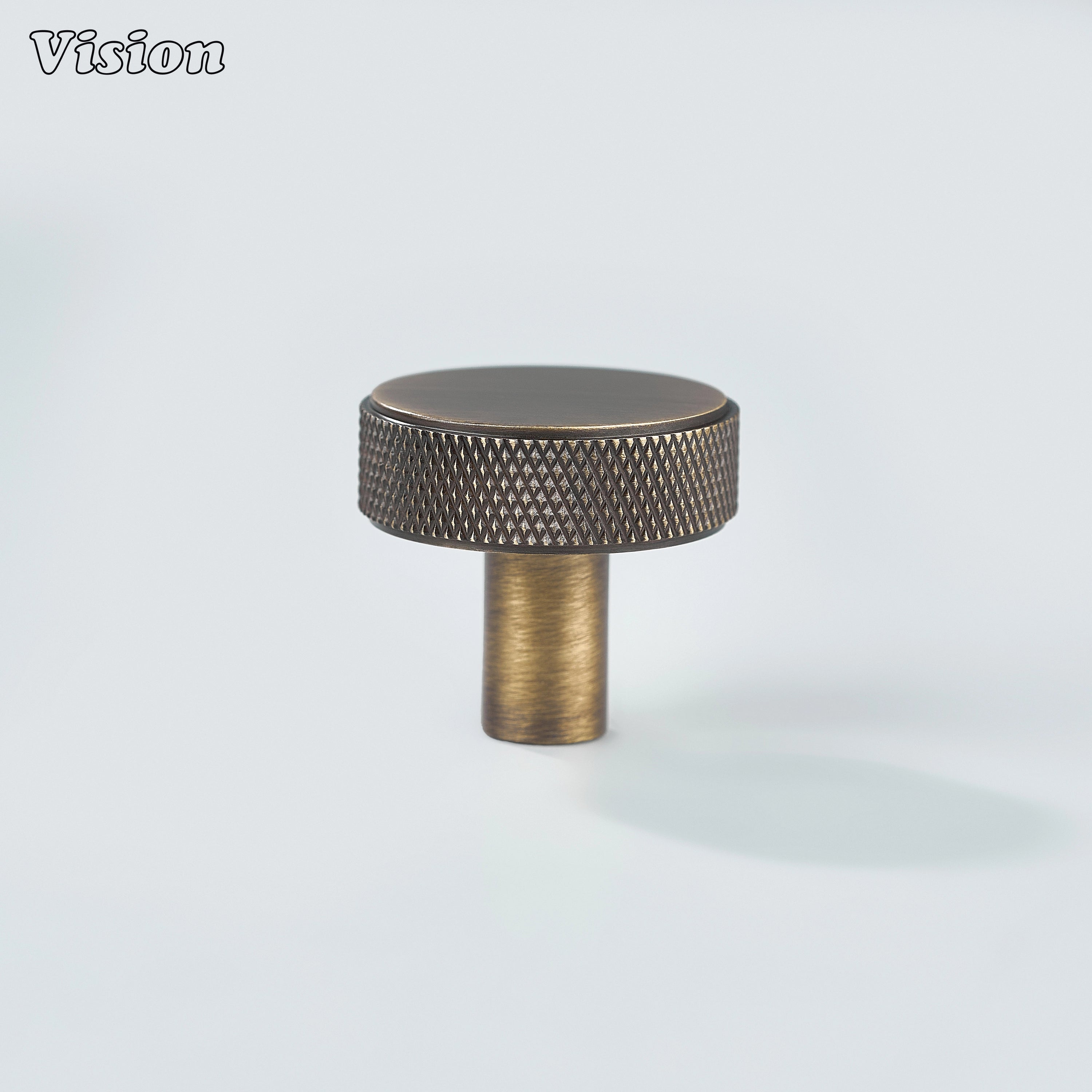 Round knurled cabinet knob in Antique Bronze finish for kitchen drawers