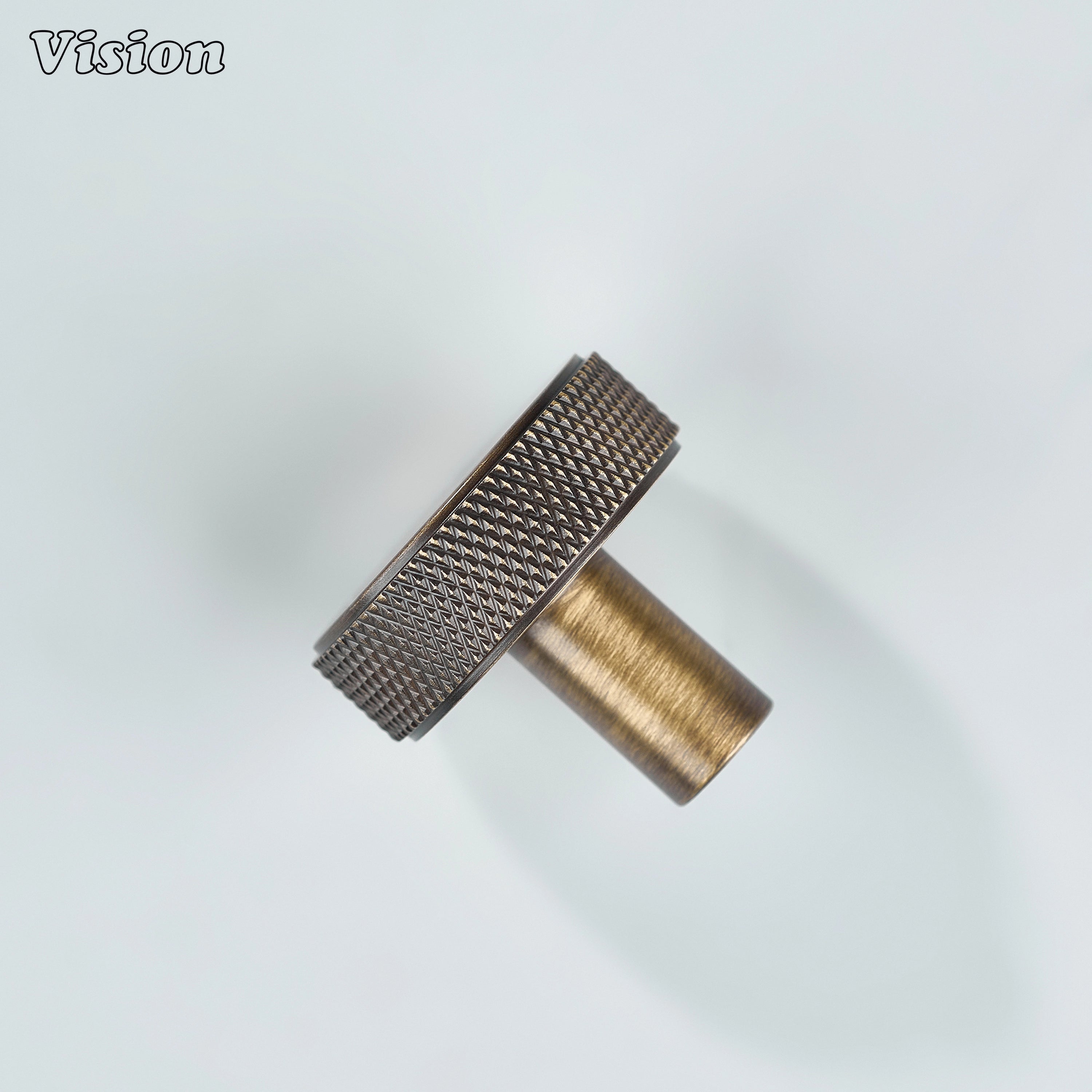 Knurled round cabinet knob in Antique Bronze finish for classic cabinets