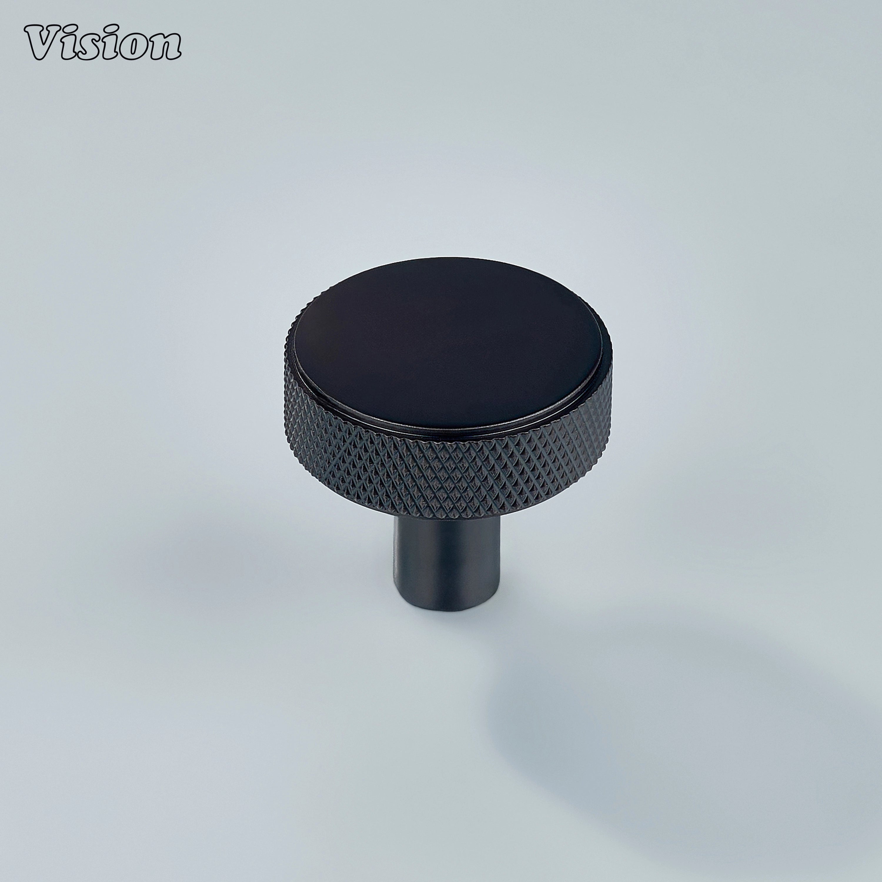Oil rubbed bronze textured round knob with clean cylindrical leg suited for drawers and cupboards.