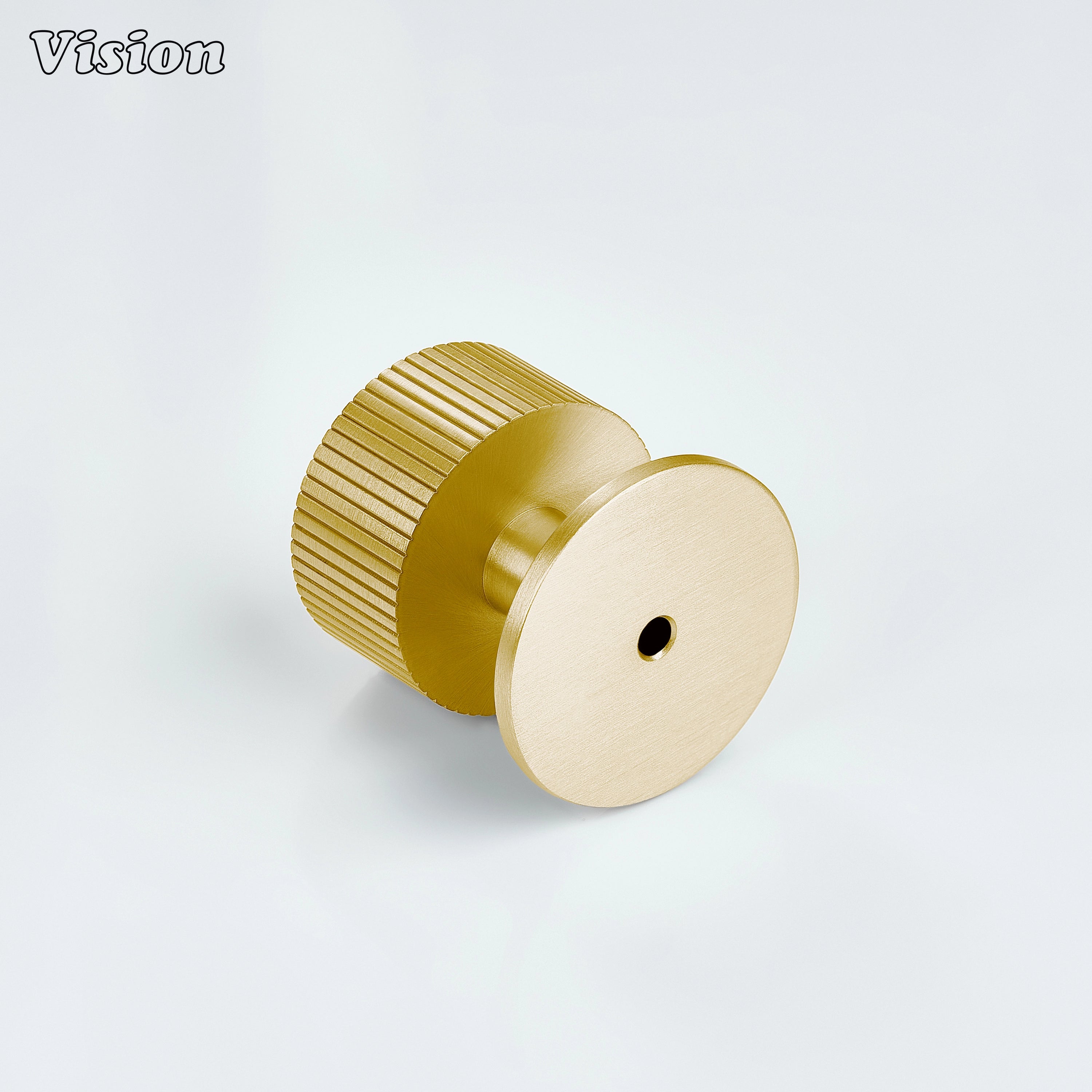 Gold round cabinet knob with detailed surface and plate for wardrobe storage