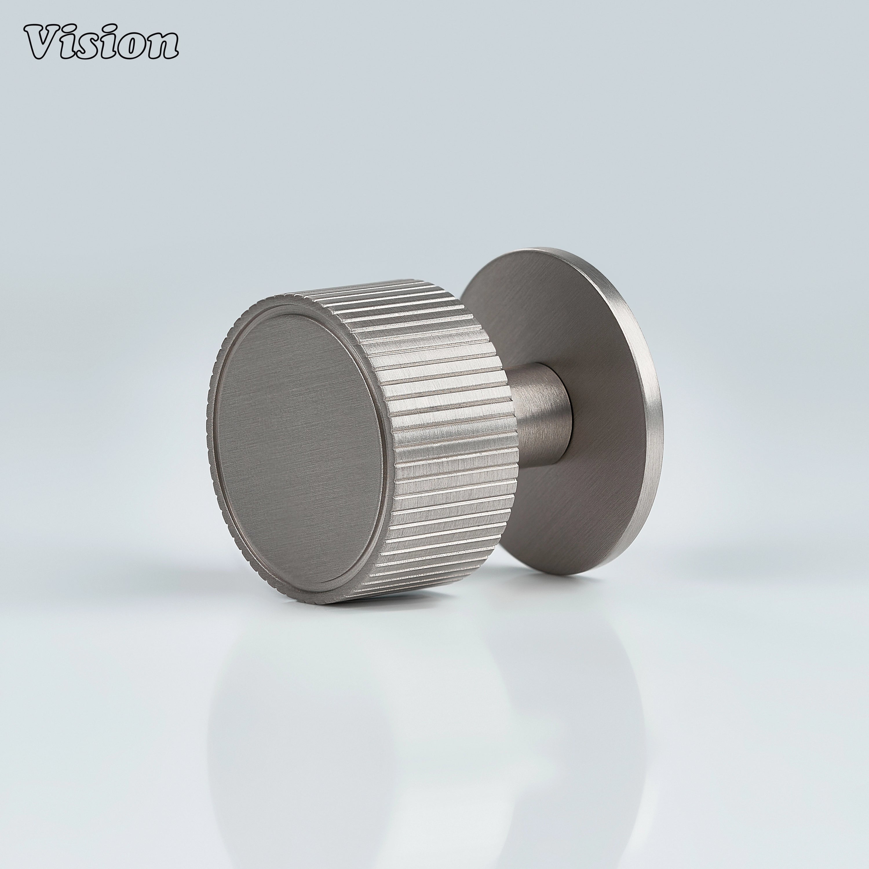 Silver round cabinet knob with linear texture for wardrobe doors