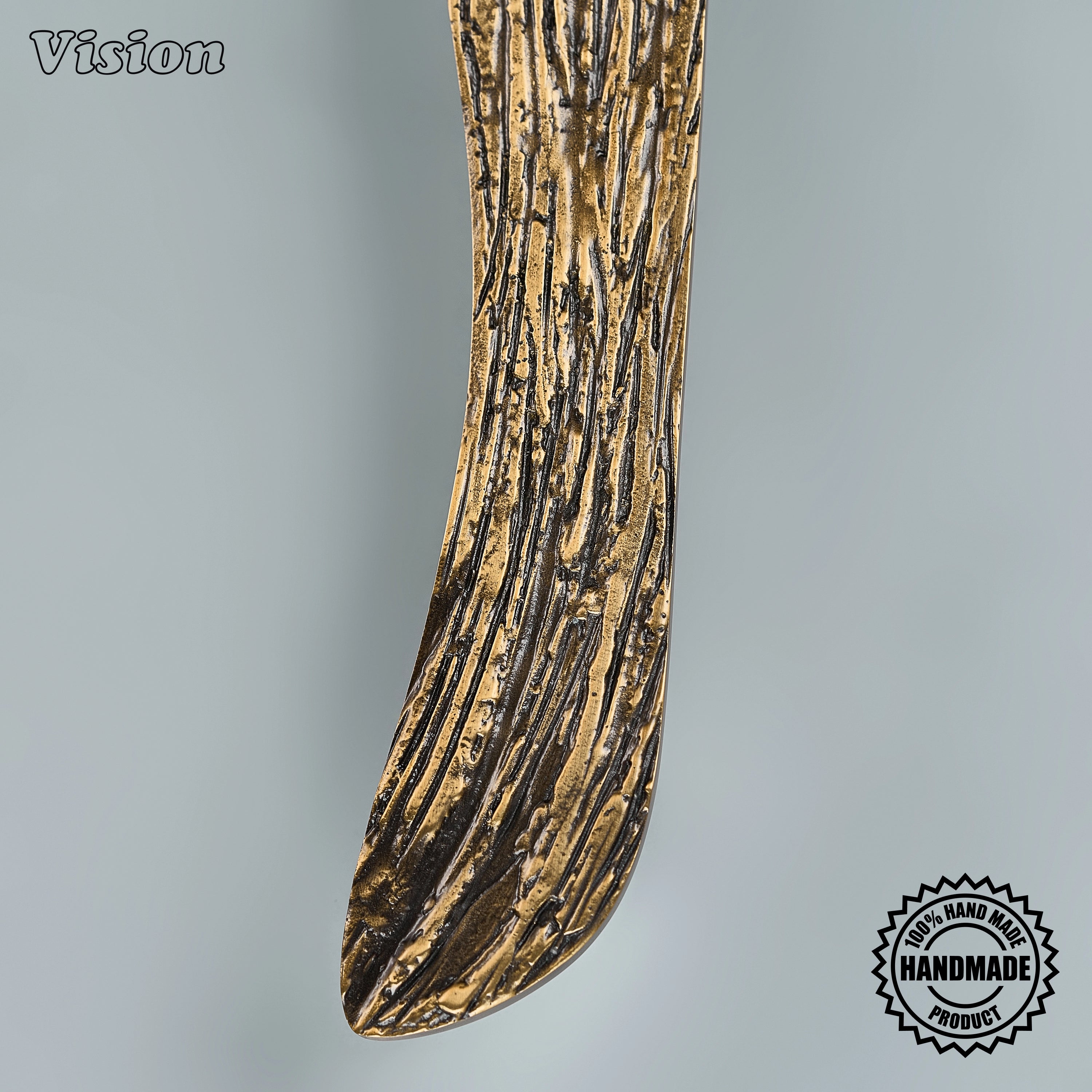 Solid brass antique bronze sculpted appliance handle with heavily textured bar for utility panels