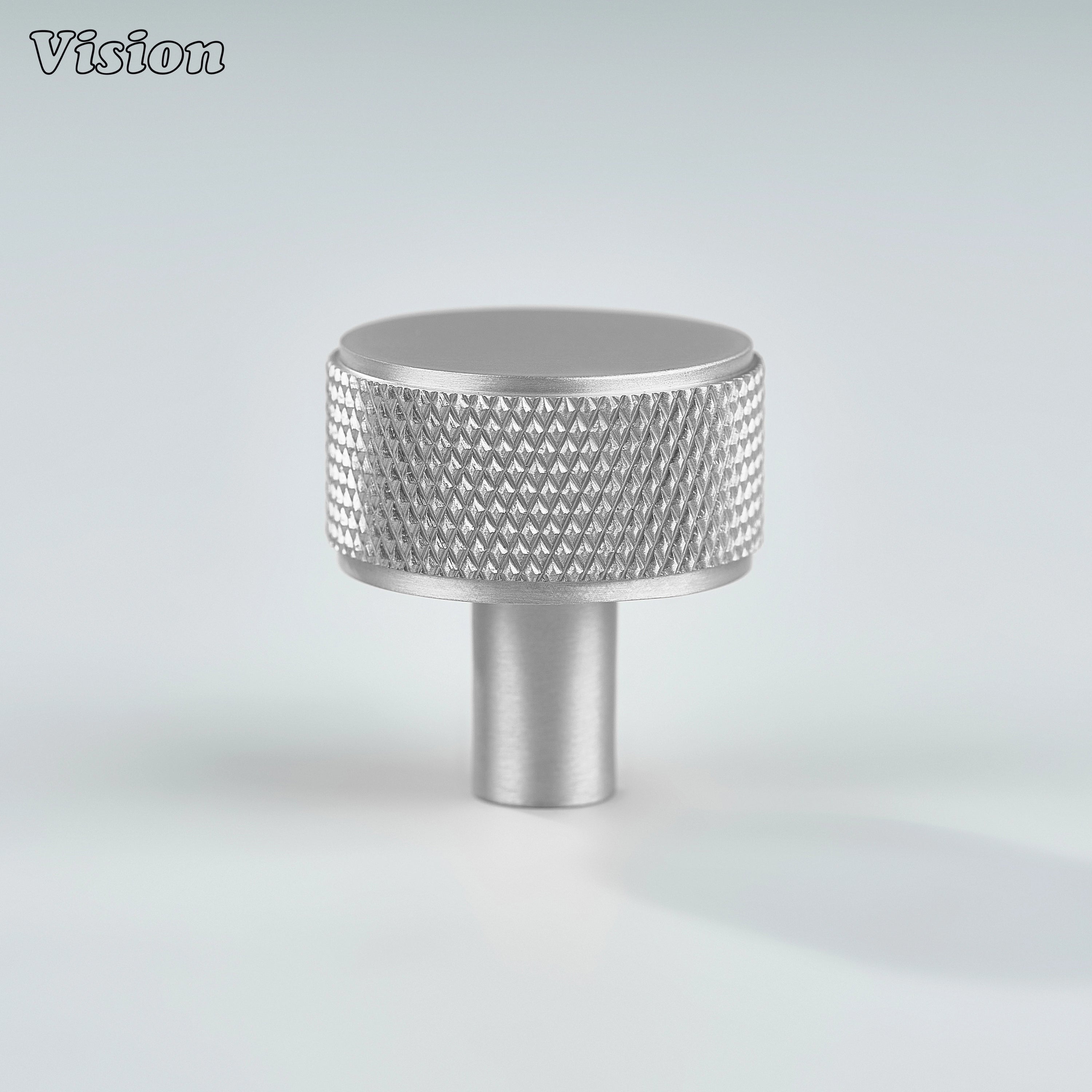 Silver round brass cabinet knob featuring textured knurling for drawers