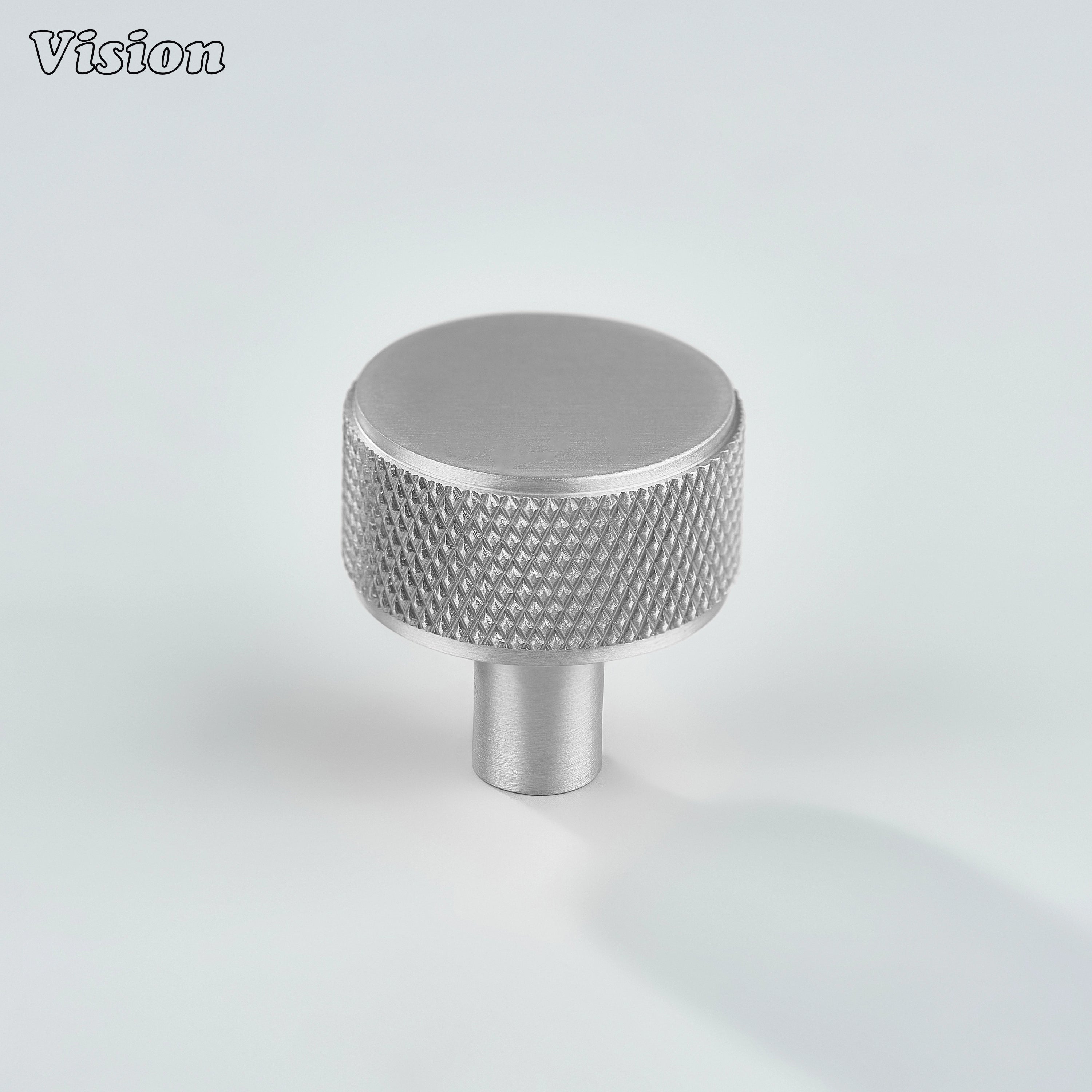 Silver knurled cabinet knob with brass construction for furniture