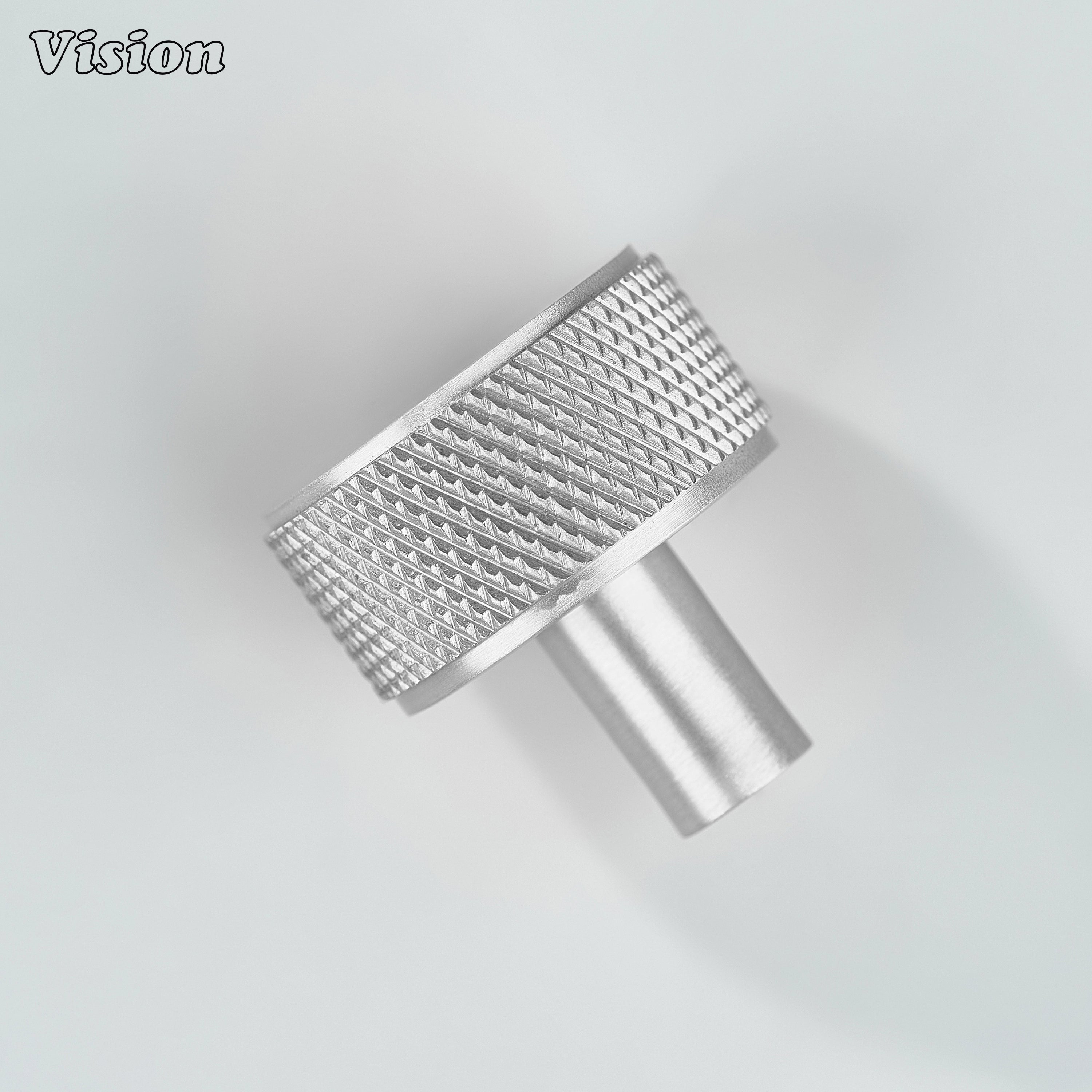 Silver cabinet knob with solid round form and cylinder base for storage units
