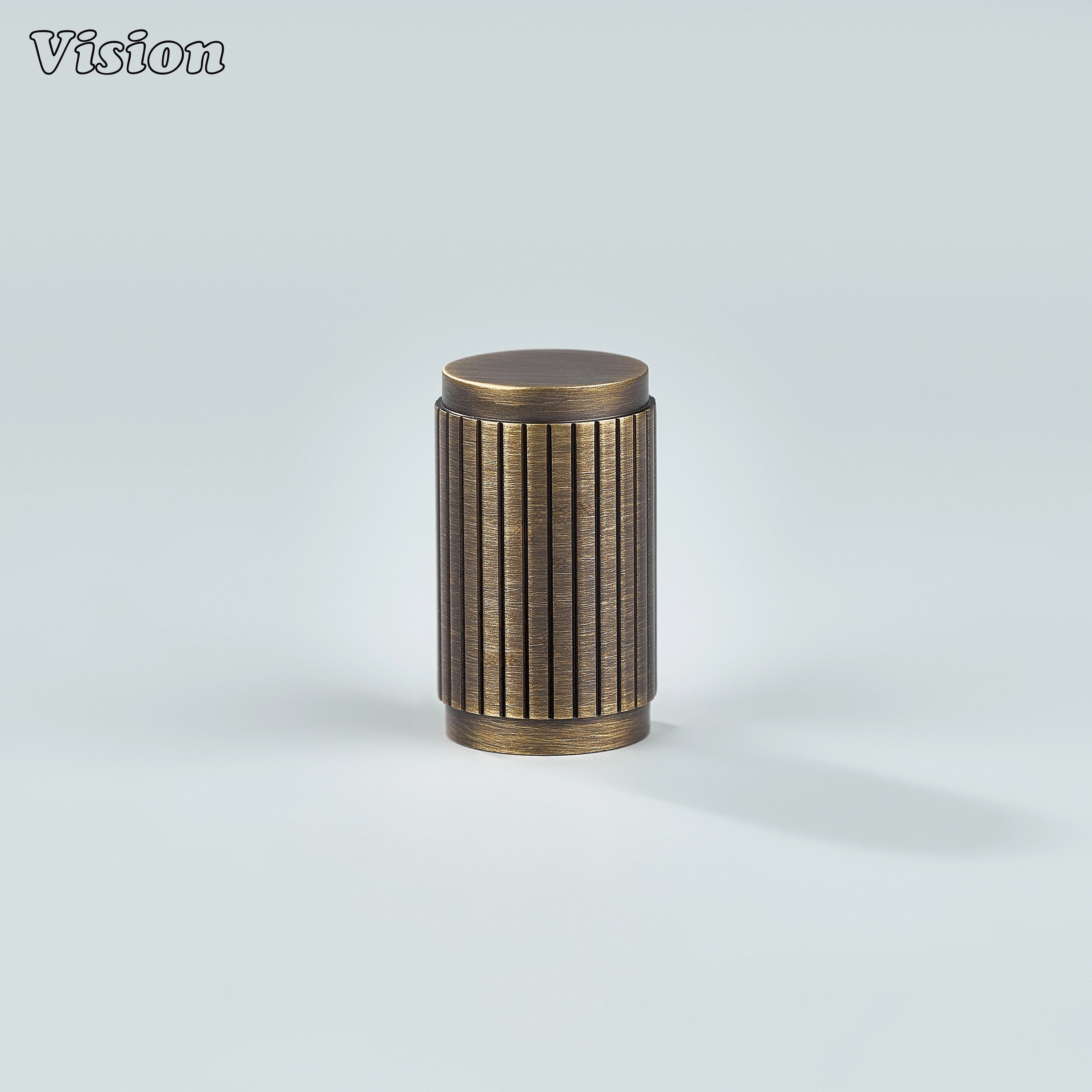Cylindrical Antique Bronze cabinet knob with linear detailing for wardrobes