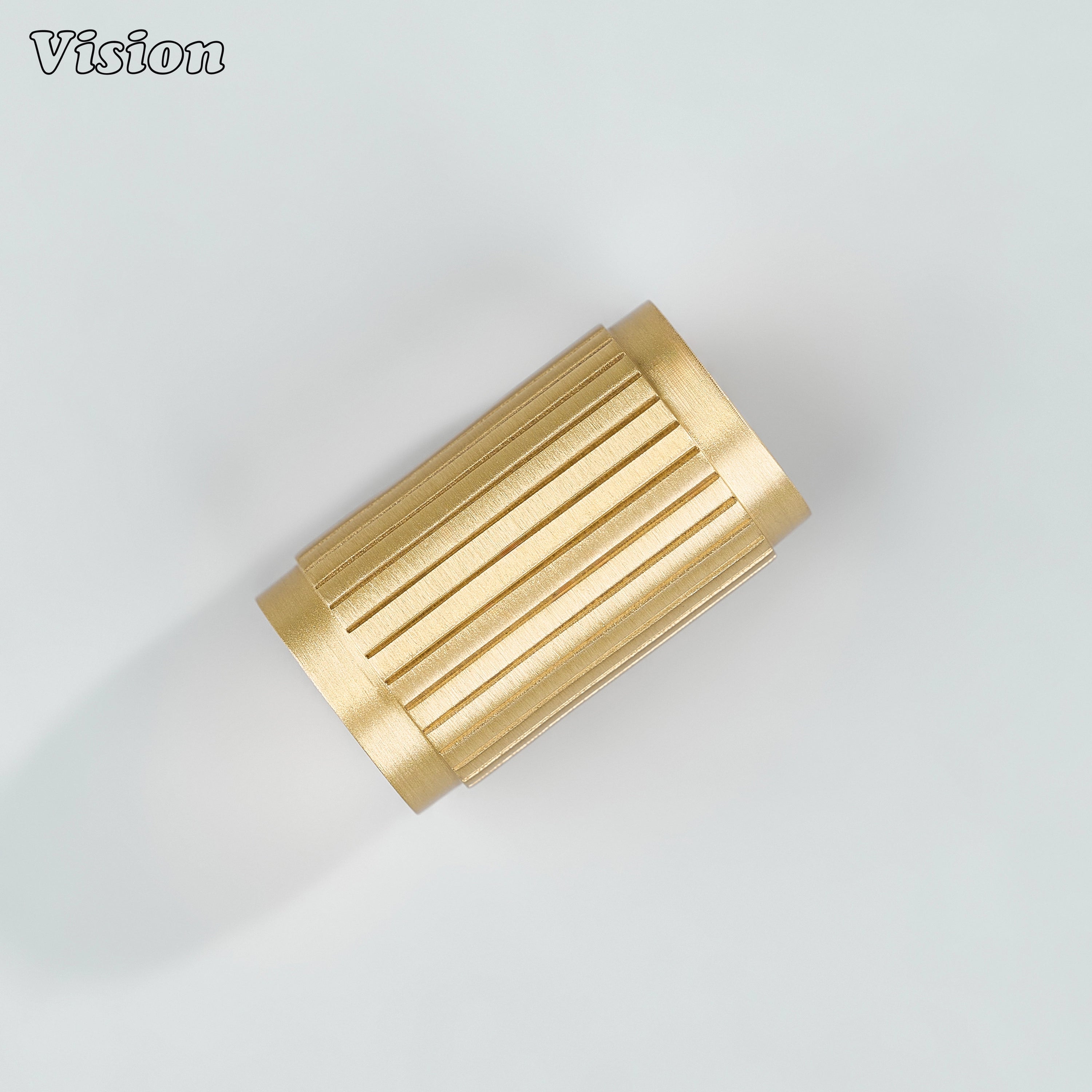 Modern gold linear knurled cabinet knob designed for premium furniture storage