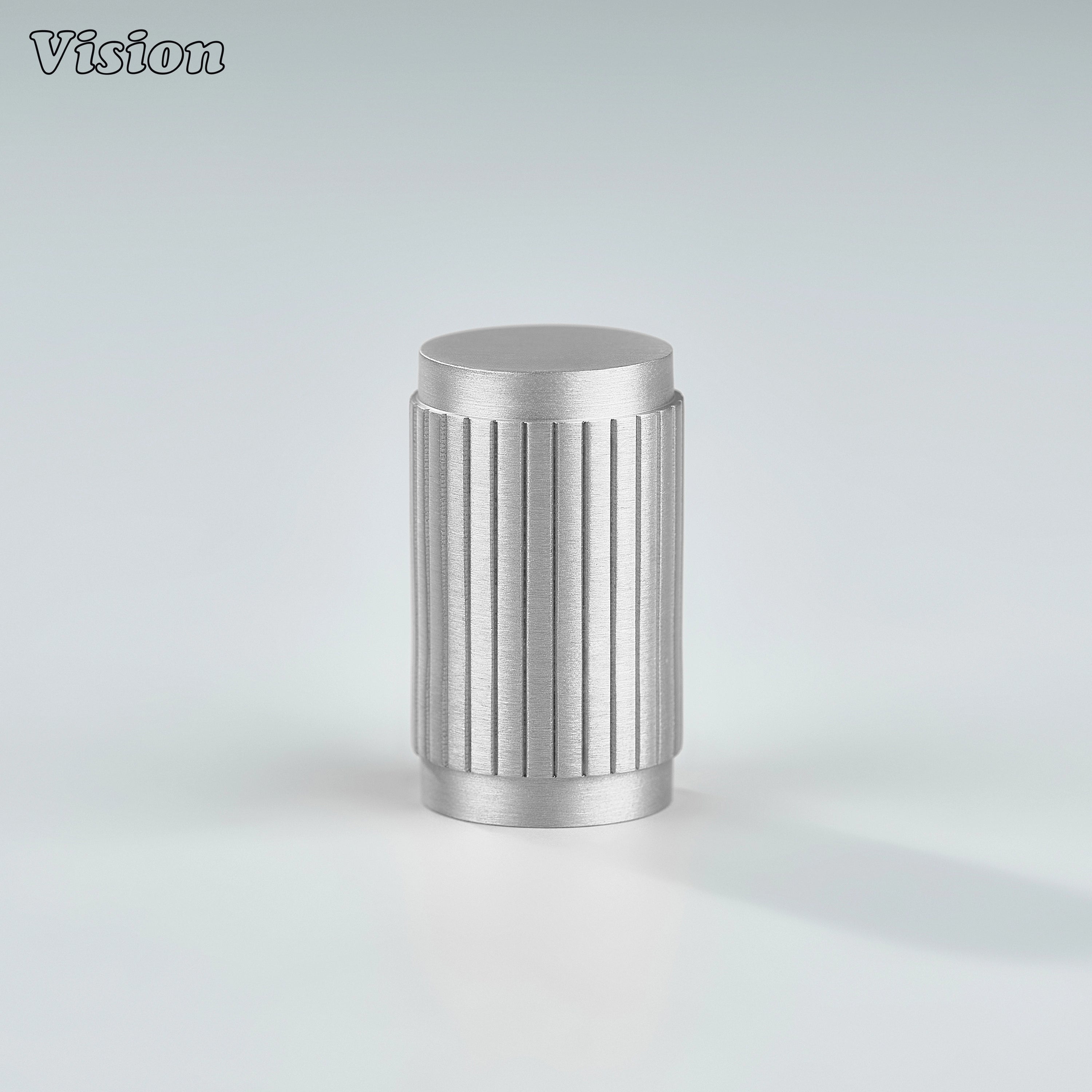 Cylindrical Silver brass cabinet knob with textured linear surface