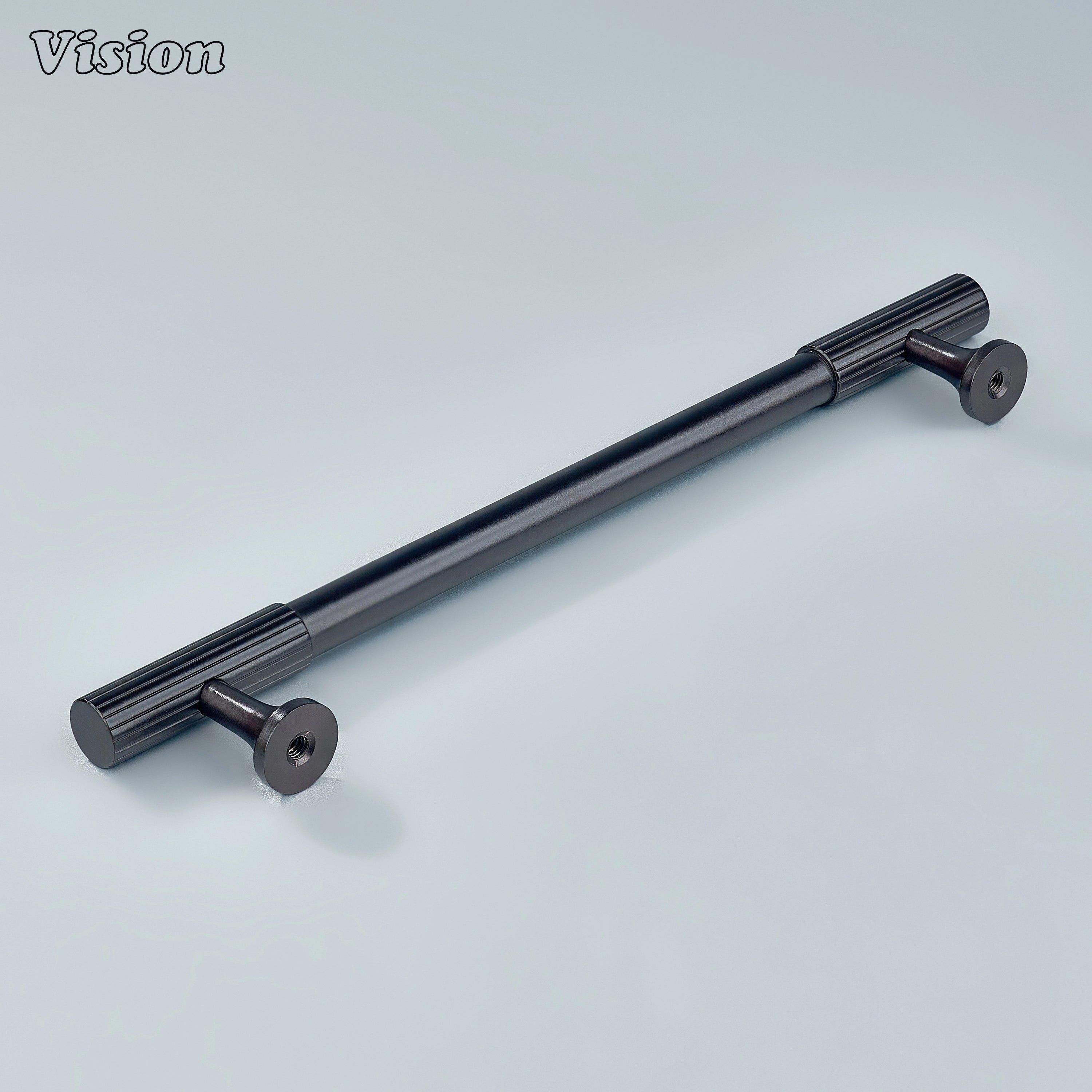 Oil rubbed bronze brass handle with refined edges and modern cylindrical profile.