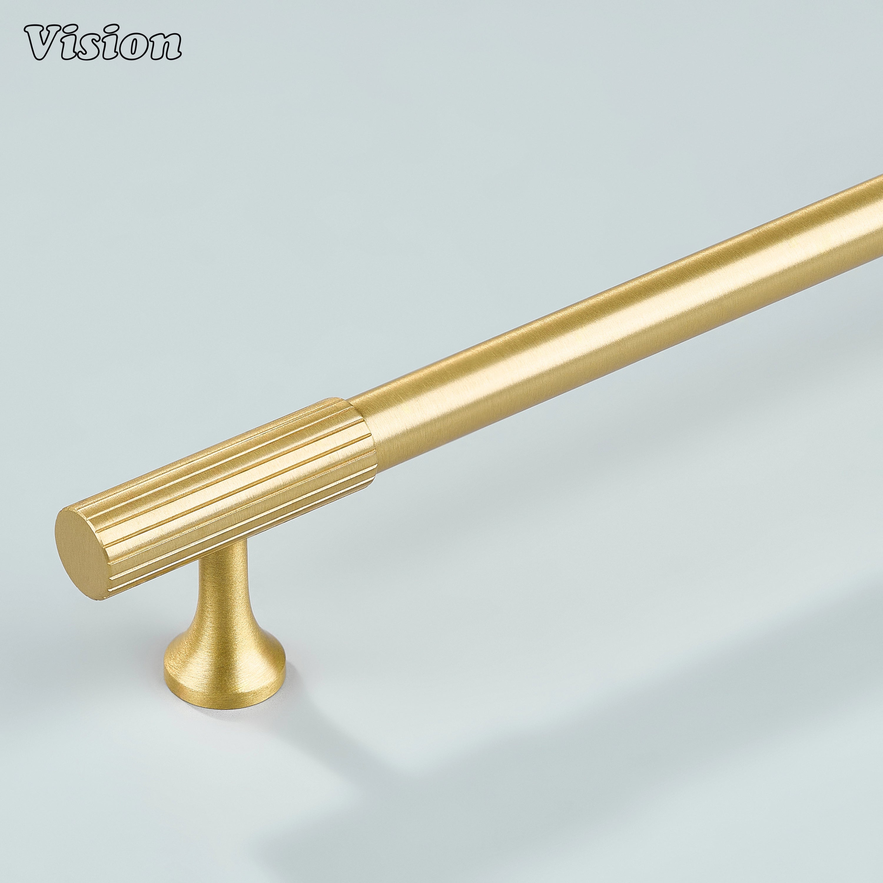 Gold Aris linear knurled cabinet handle made from solid brass for modern furniture.