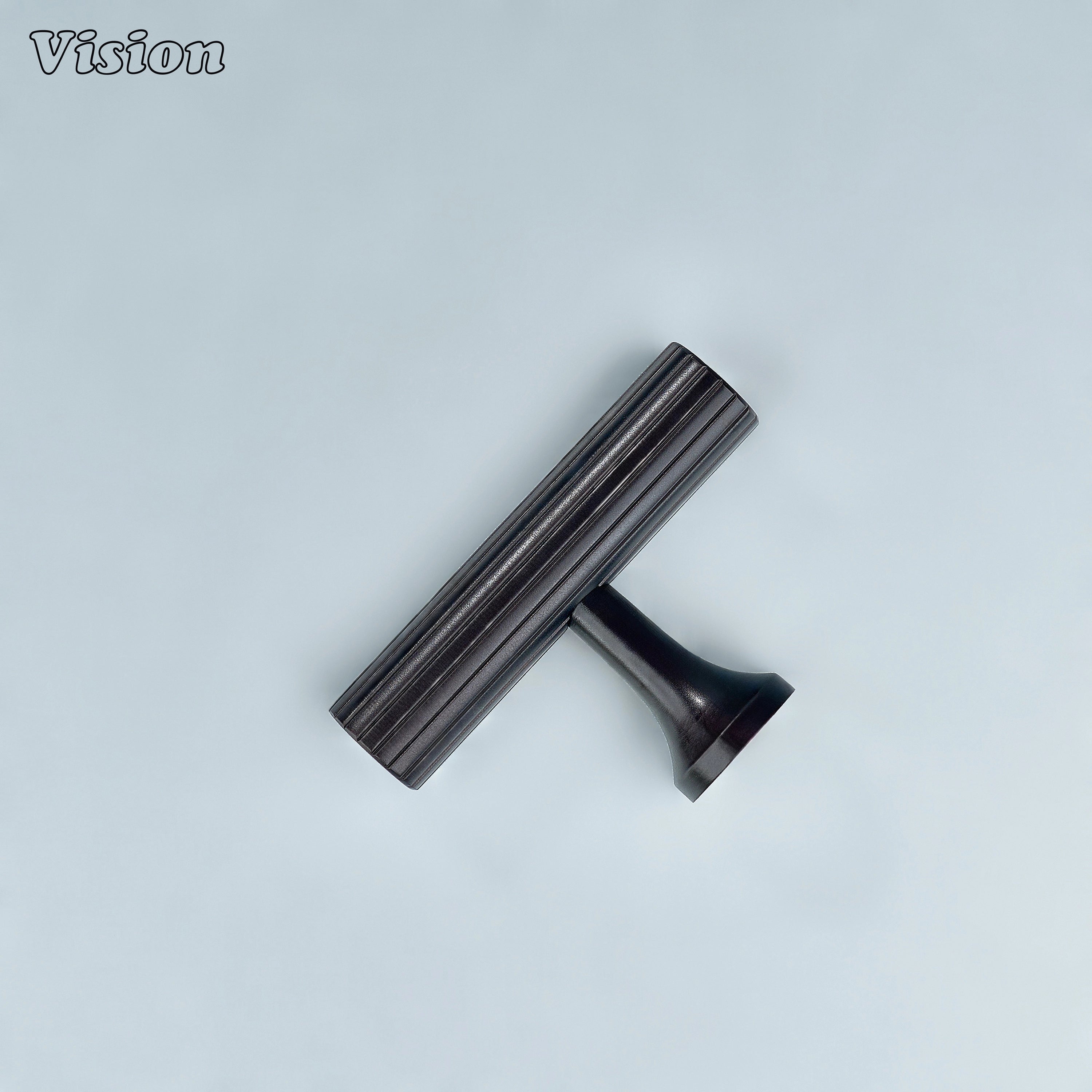 Oil rubbed bronze textured T-knob for cupboards.