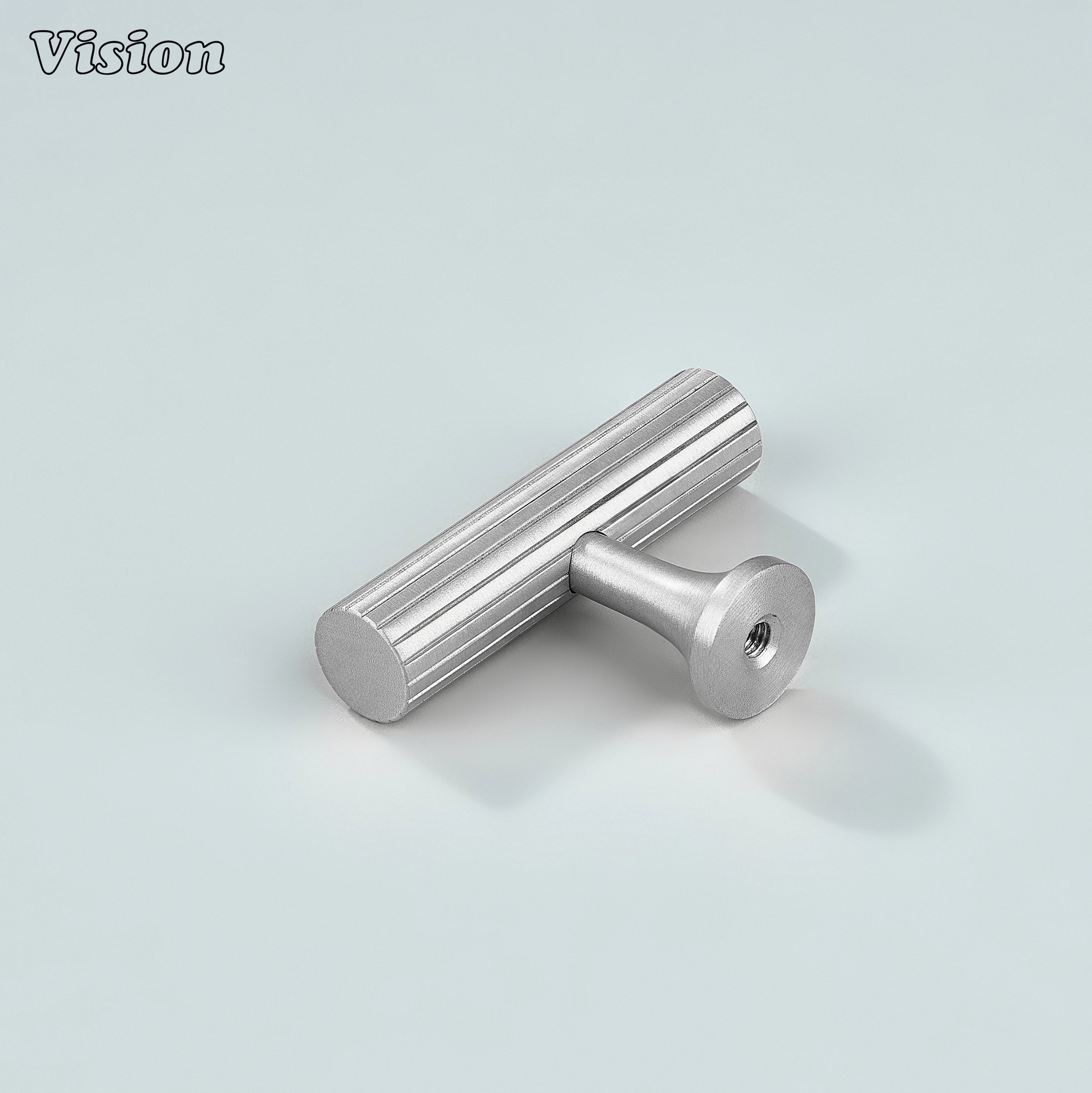 Silver T-knob featuring fine linear knurling for cabinetry.