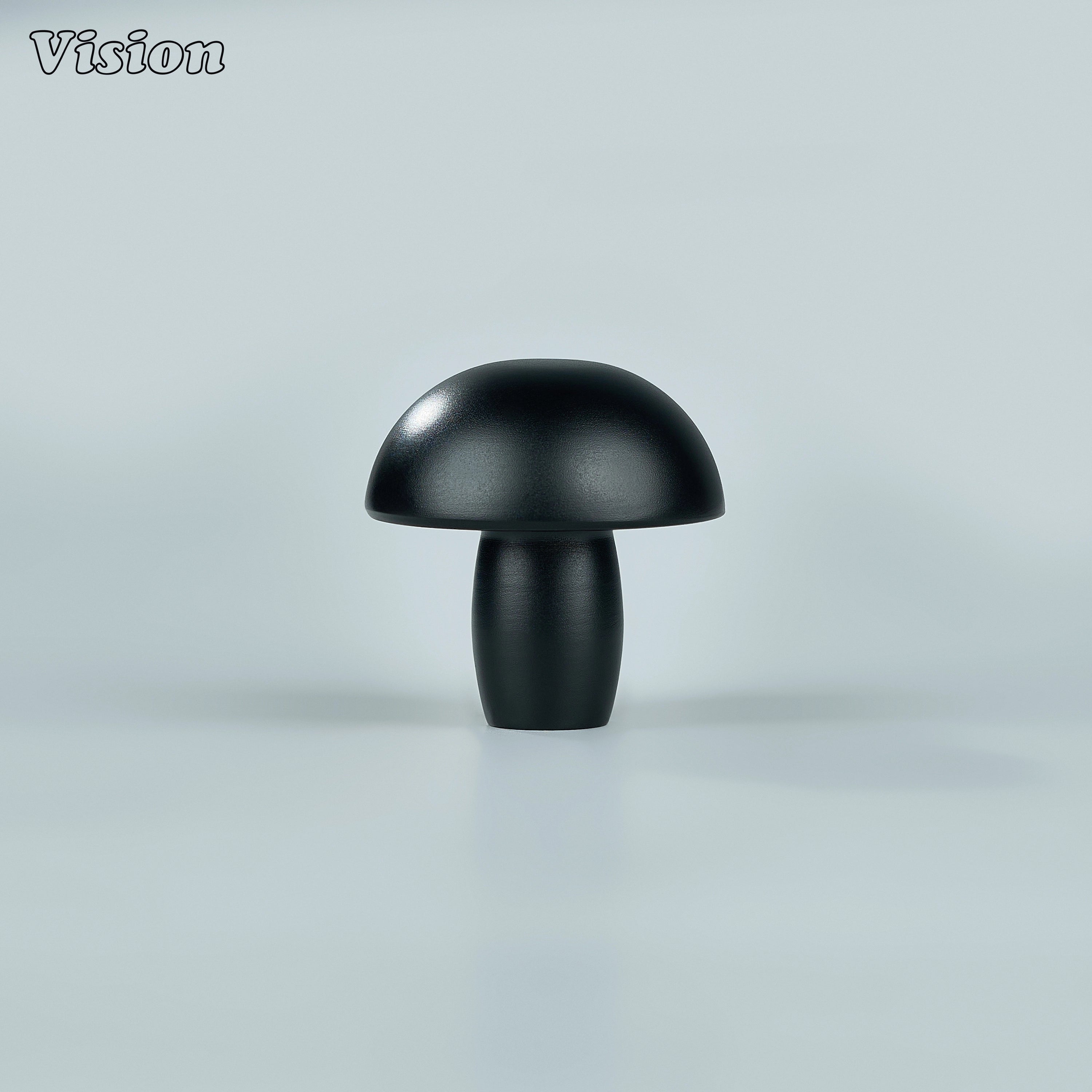 Black solid brass mushroom cabinet knob with smooth round profile for modern kitchen cabinets and drawers