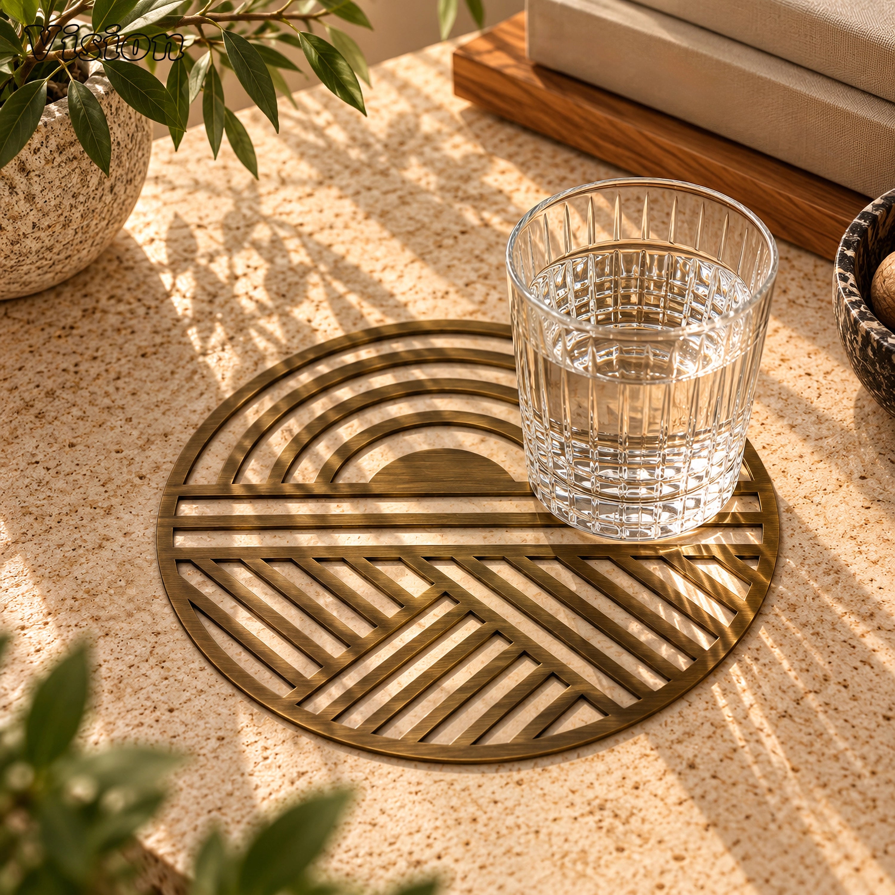 Round antique bronze tabletop coaster with concentric brass arches and angled lines on a wooden bar cart