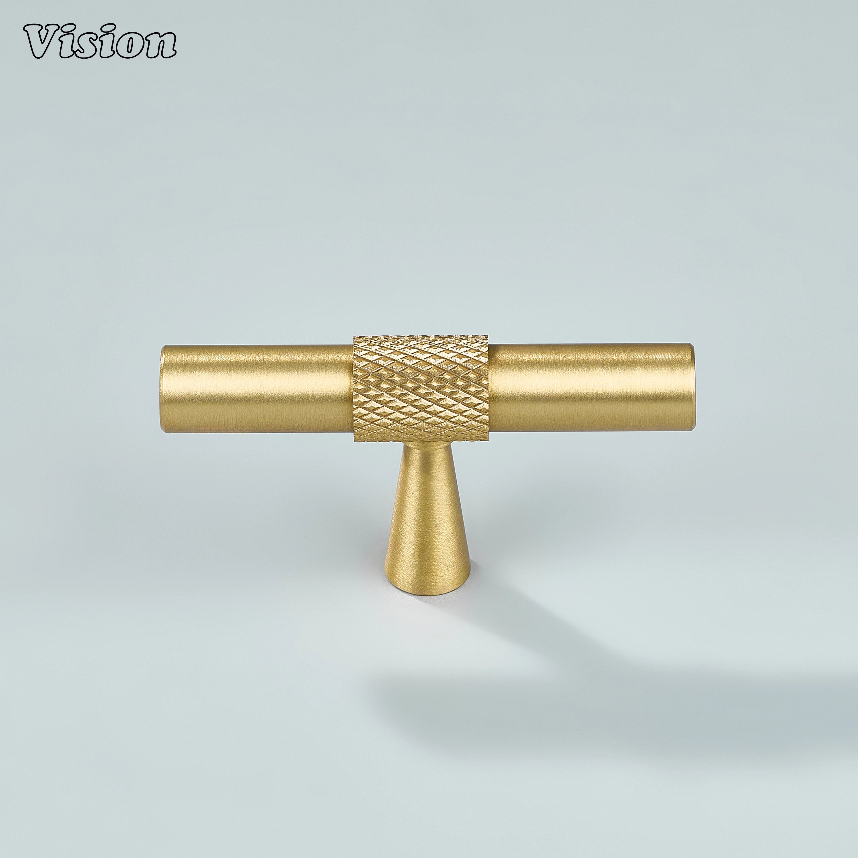 Gold brass T-shaped cabinet knob with knurled grip for modern wardrobes.
