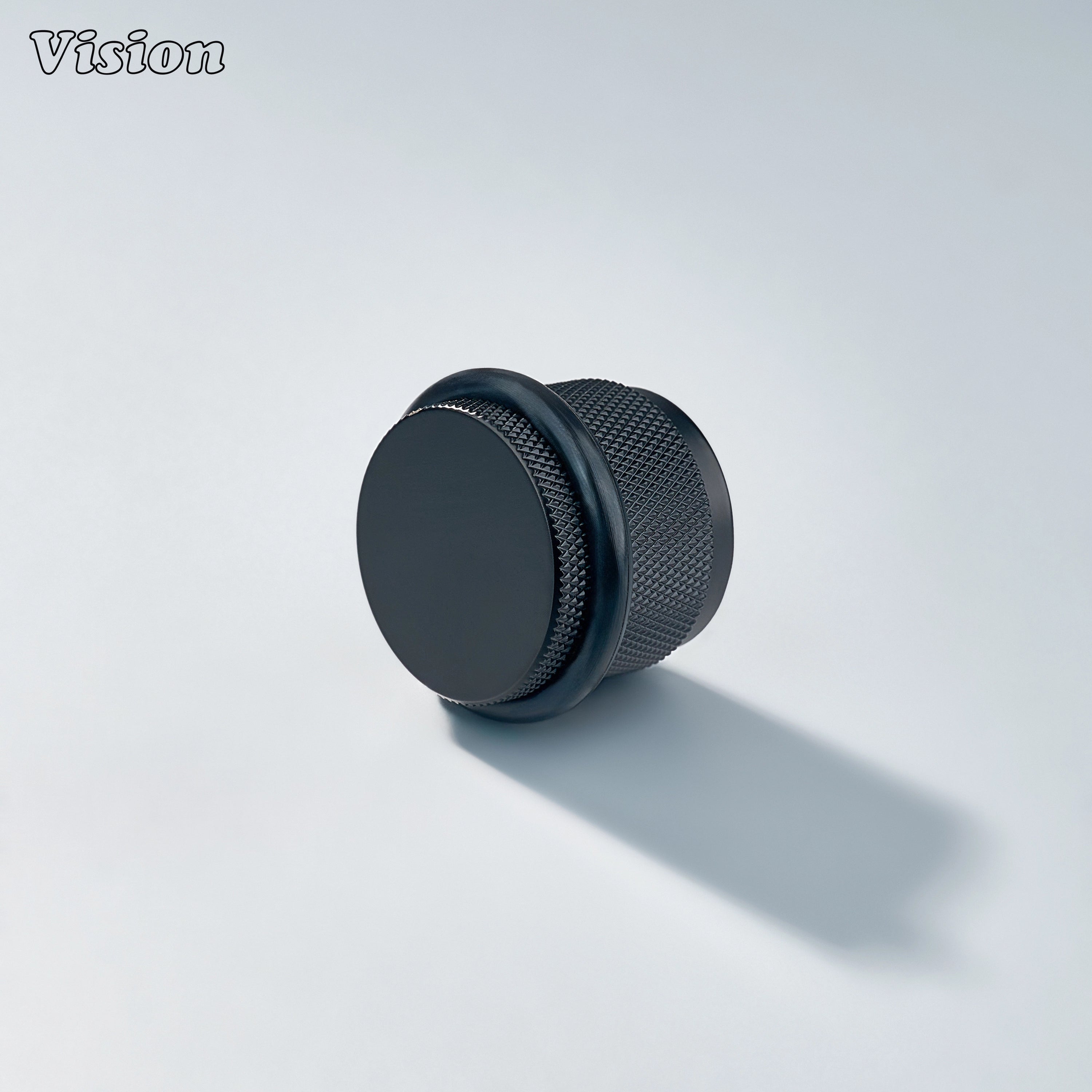 Black diamond knurled solid brass door stop with rubber bumper for protecting kitchen cabinet doors and walls