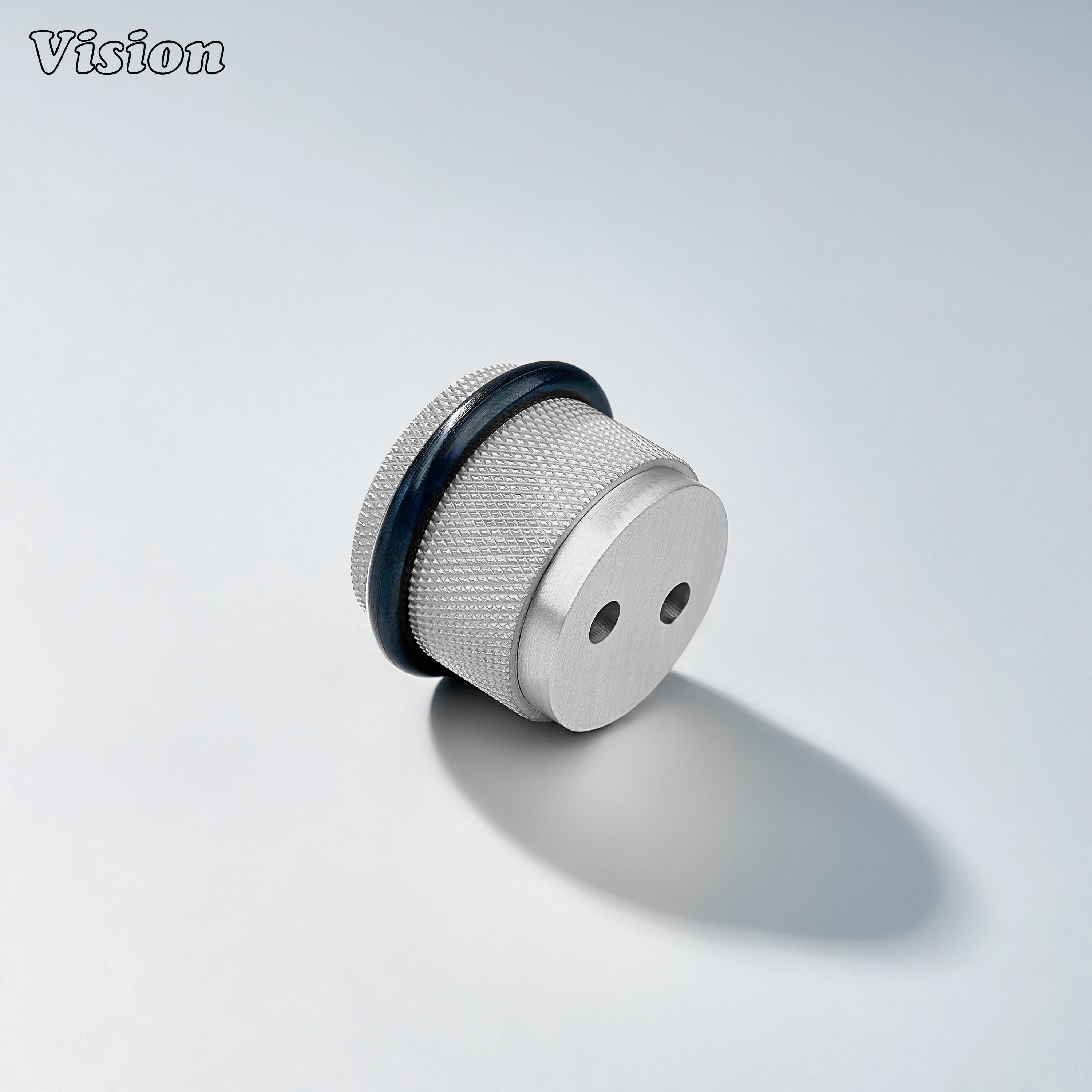 Contemporary Silver door stop with textured brass construction and rubber buffer for residential doors