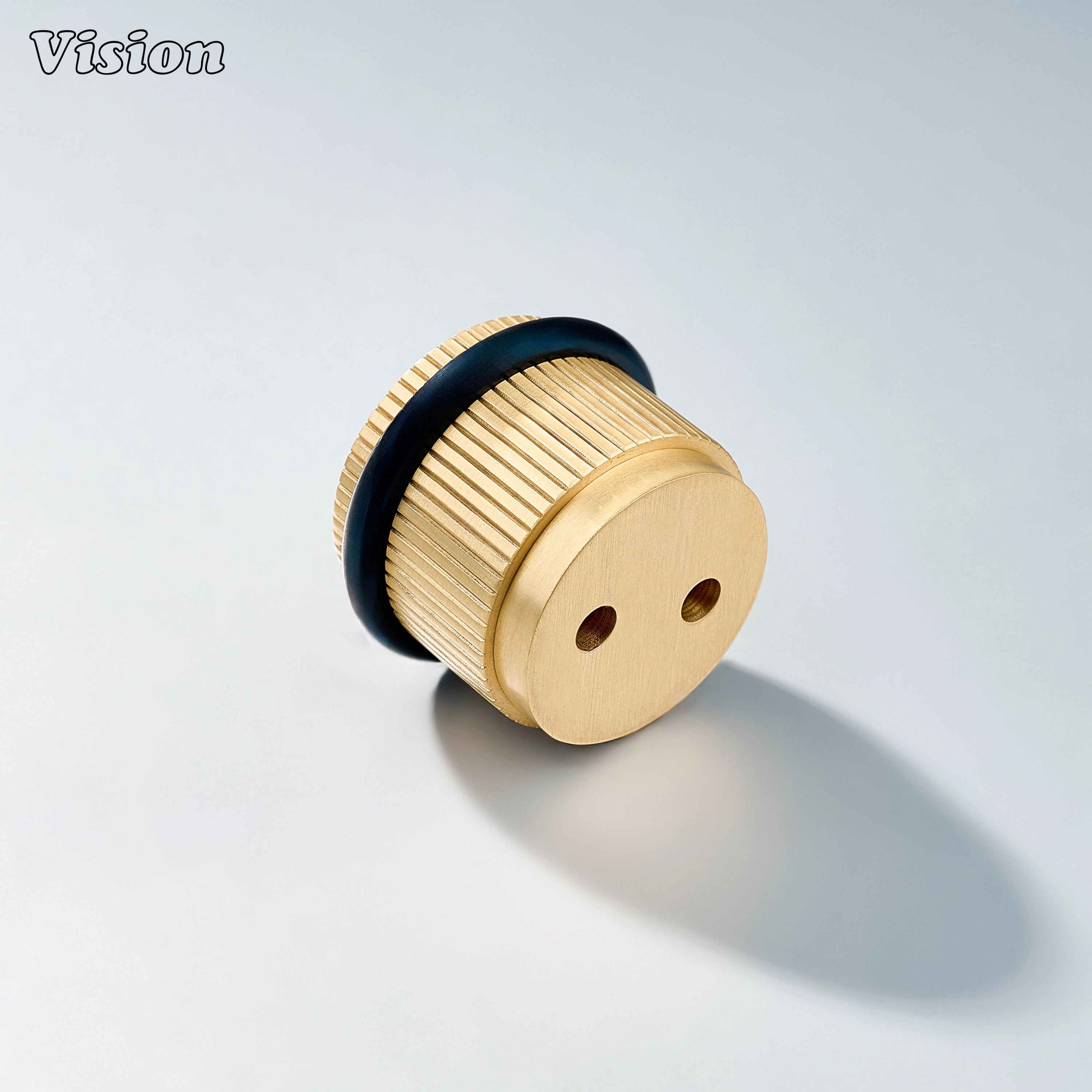 Architectural Gold brass door stop with linear texture and rubber guard for modern residential spaces