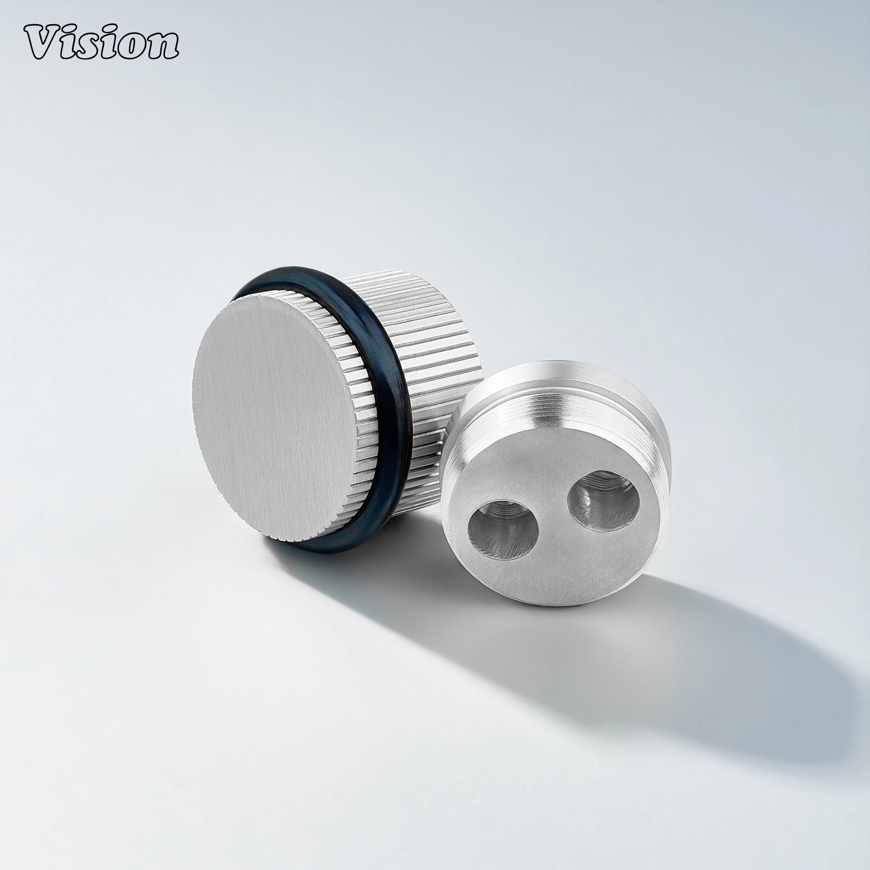Silver linear knurled floor door stop with cylindrical body for luxury furniture and cabinet installations