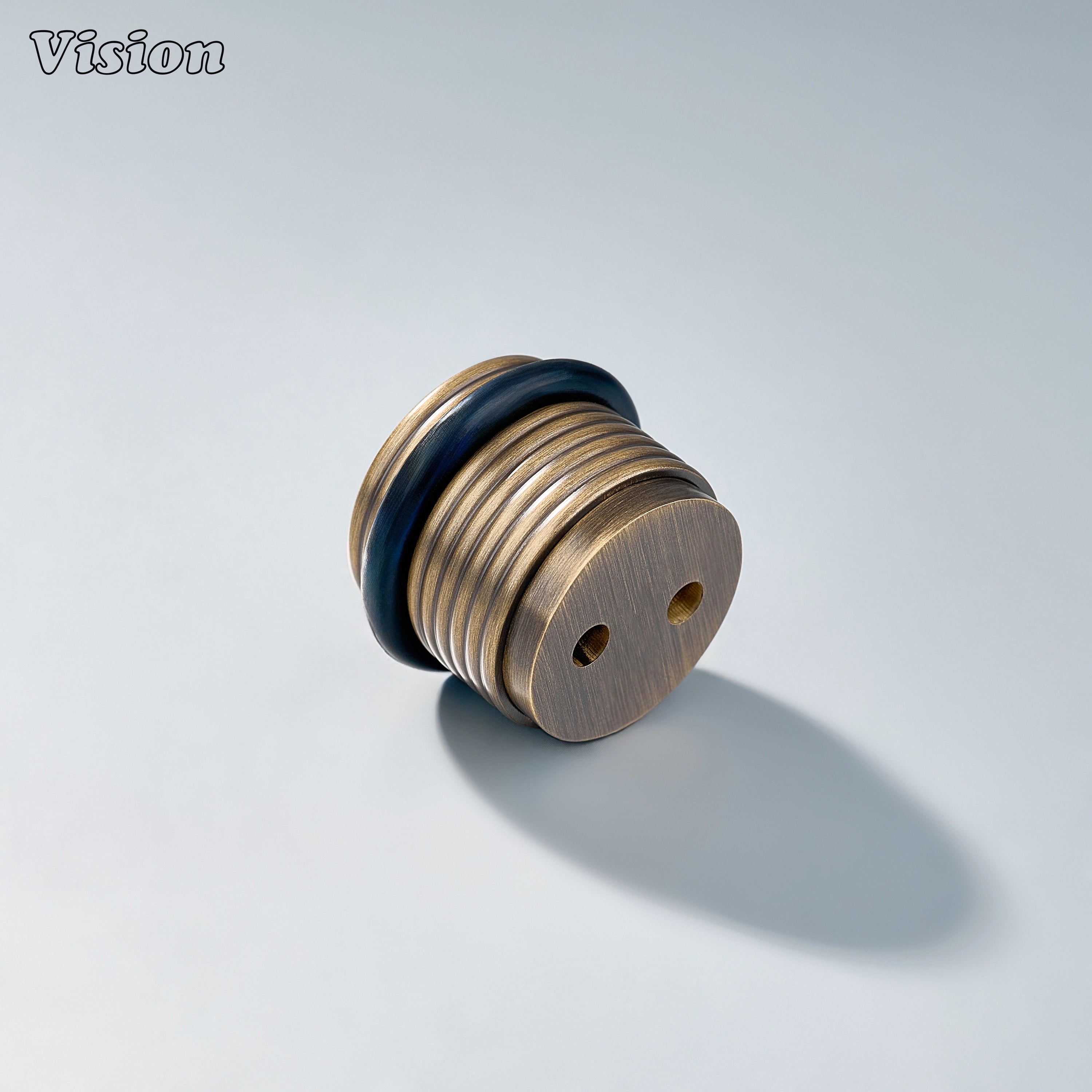 Antique Bronze floor door stop with concentric ring profile and rubber bumper for cabinetry installations