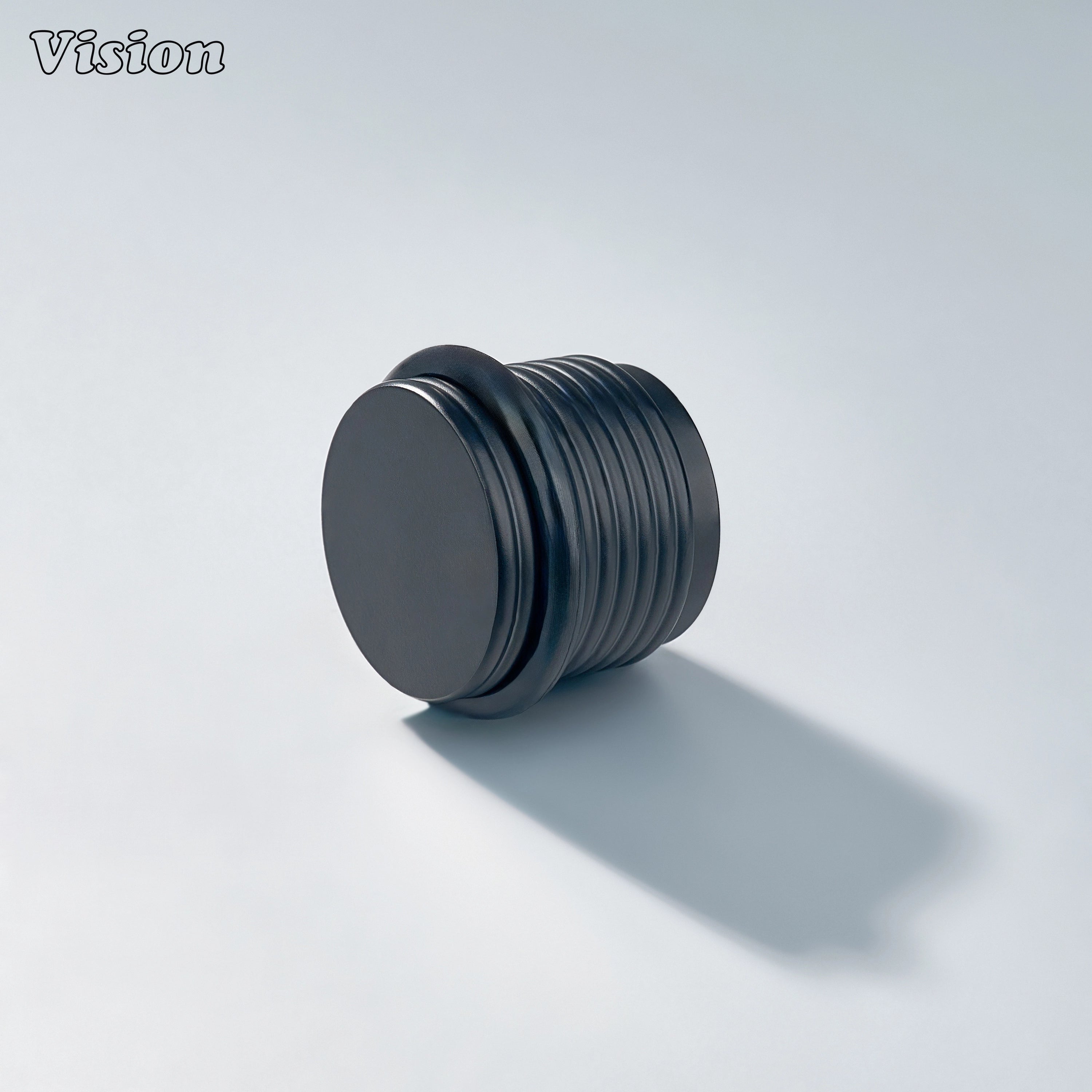 Black ringed knurled door stop with round brass top and protective rubber bumper for kitchen cabinet doors and walls