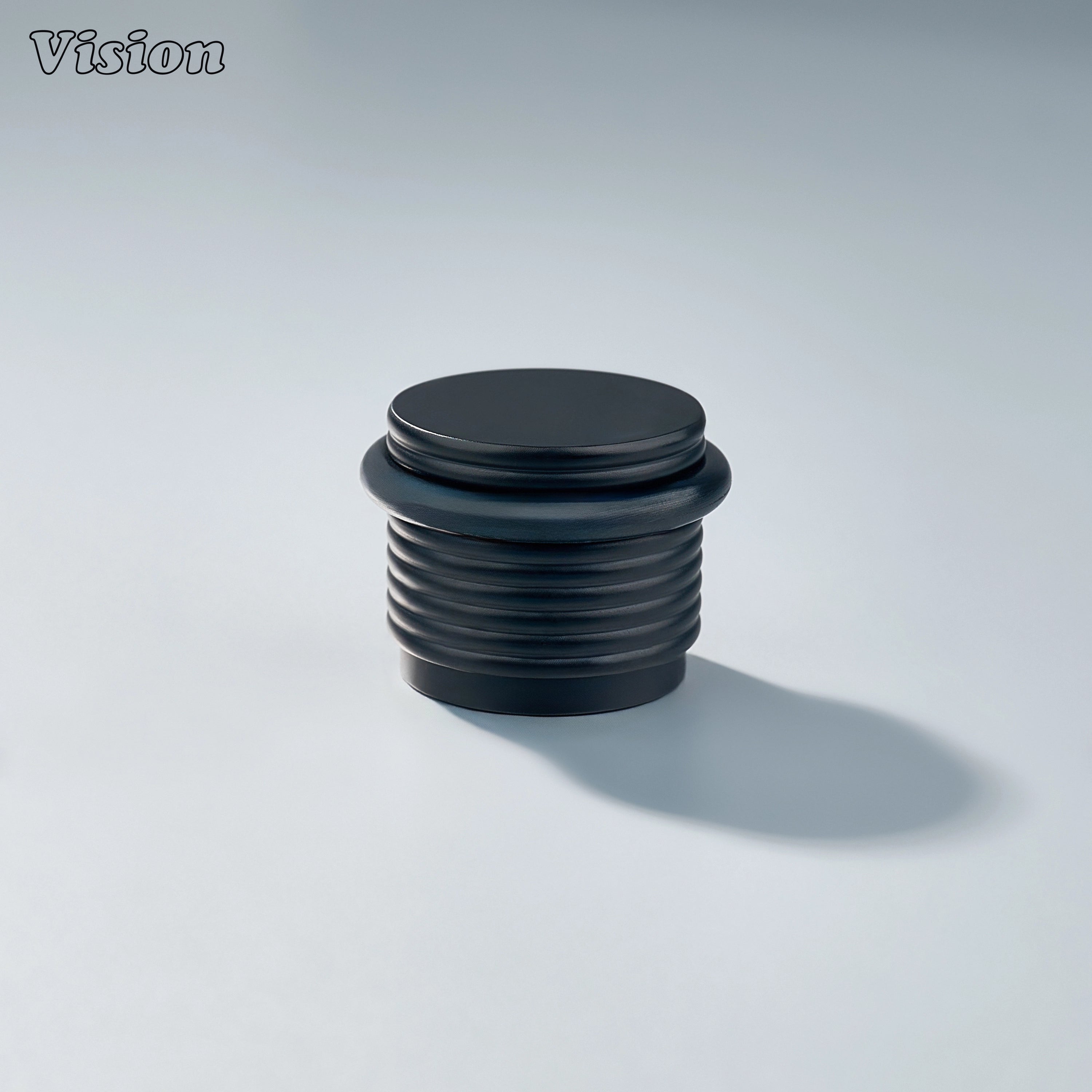 Premium Black door stop with concentric ridges and impact-resistant rubber ring for office interiors