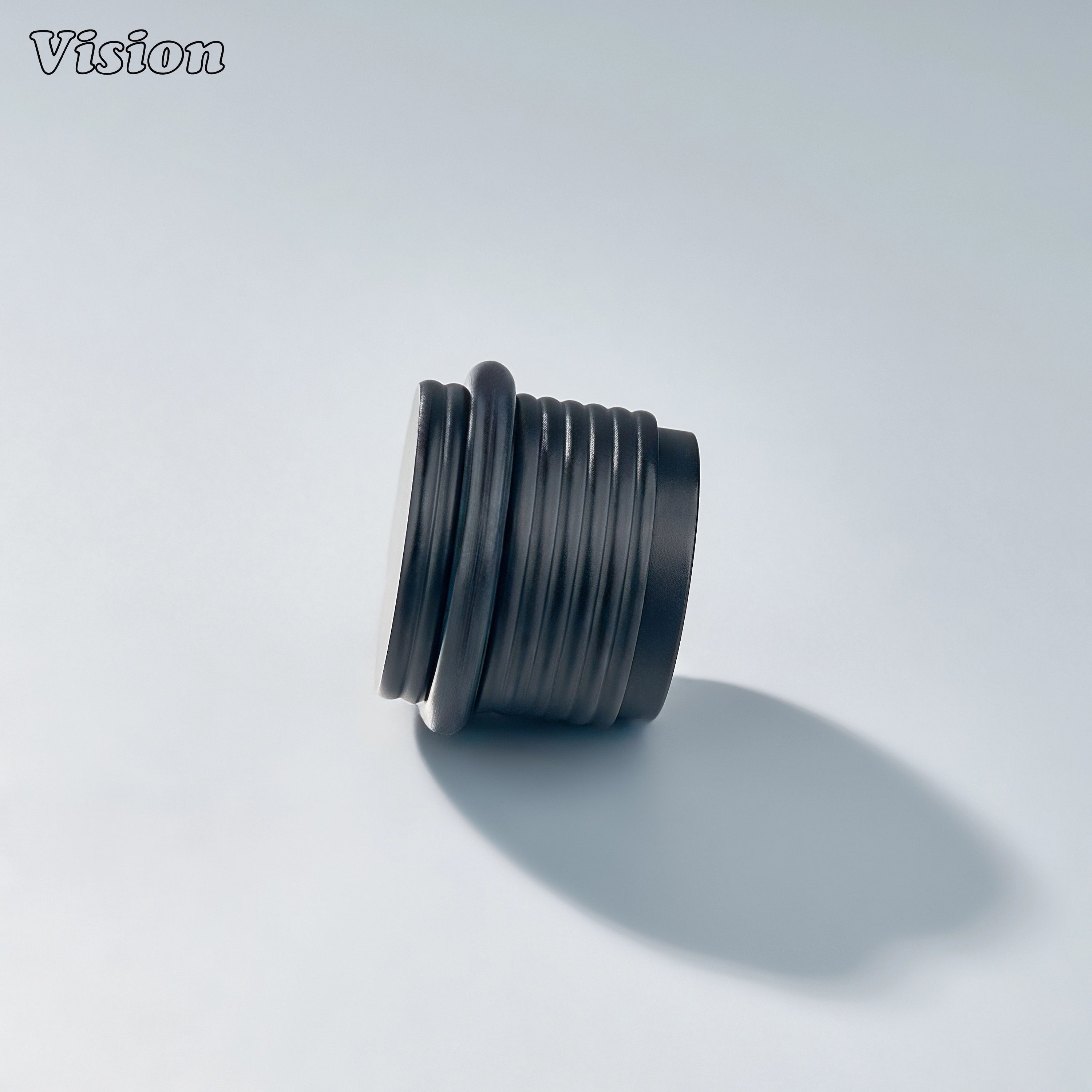 Heavy-duty Black brass door stop with ringed cylindrical body for entryways, wardrobes, and furniture