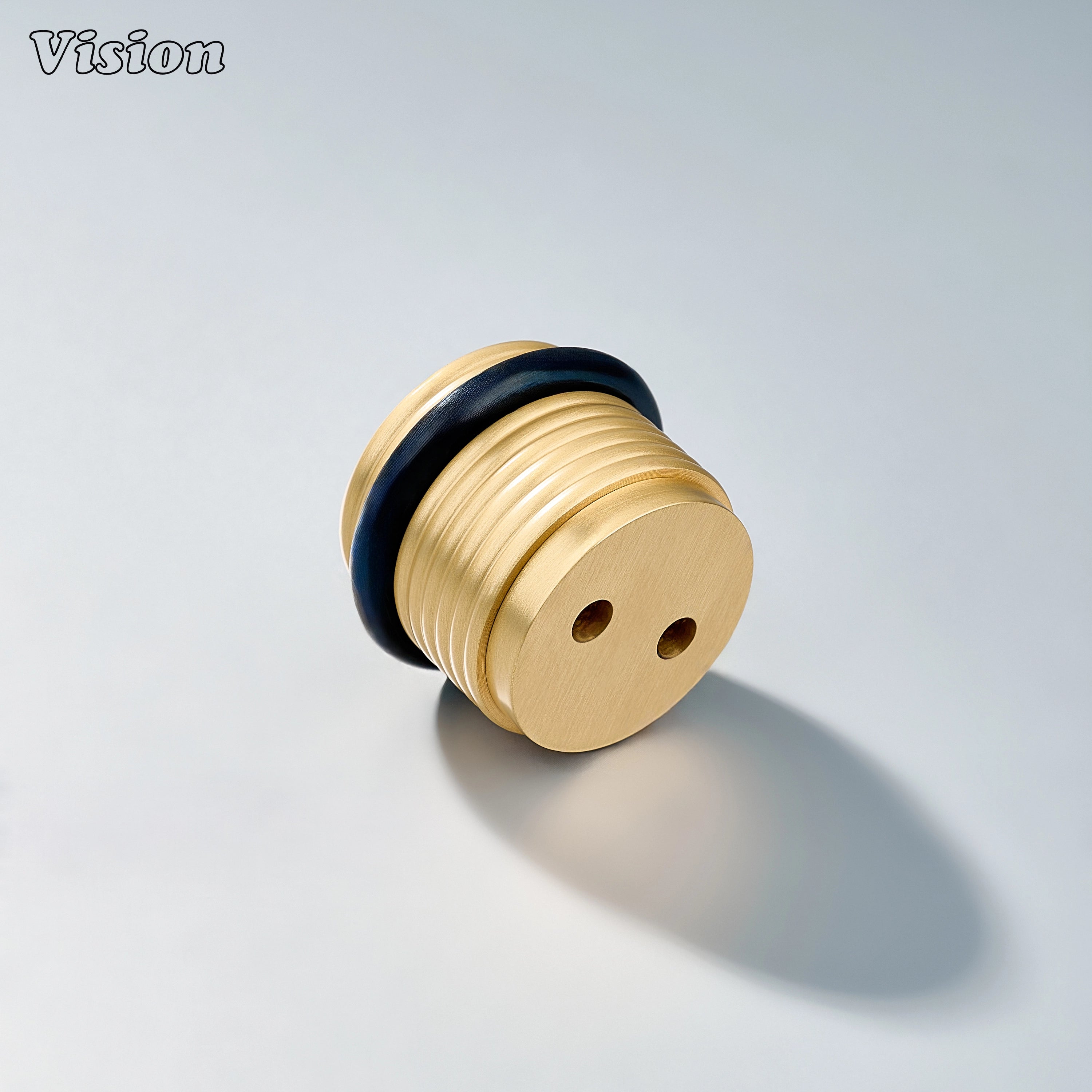 Gold floor door stop with concentric ring profile and rubber bumper for residential cabinetry applications