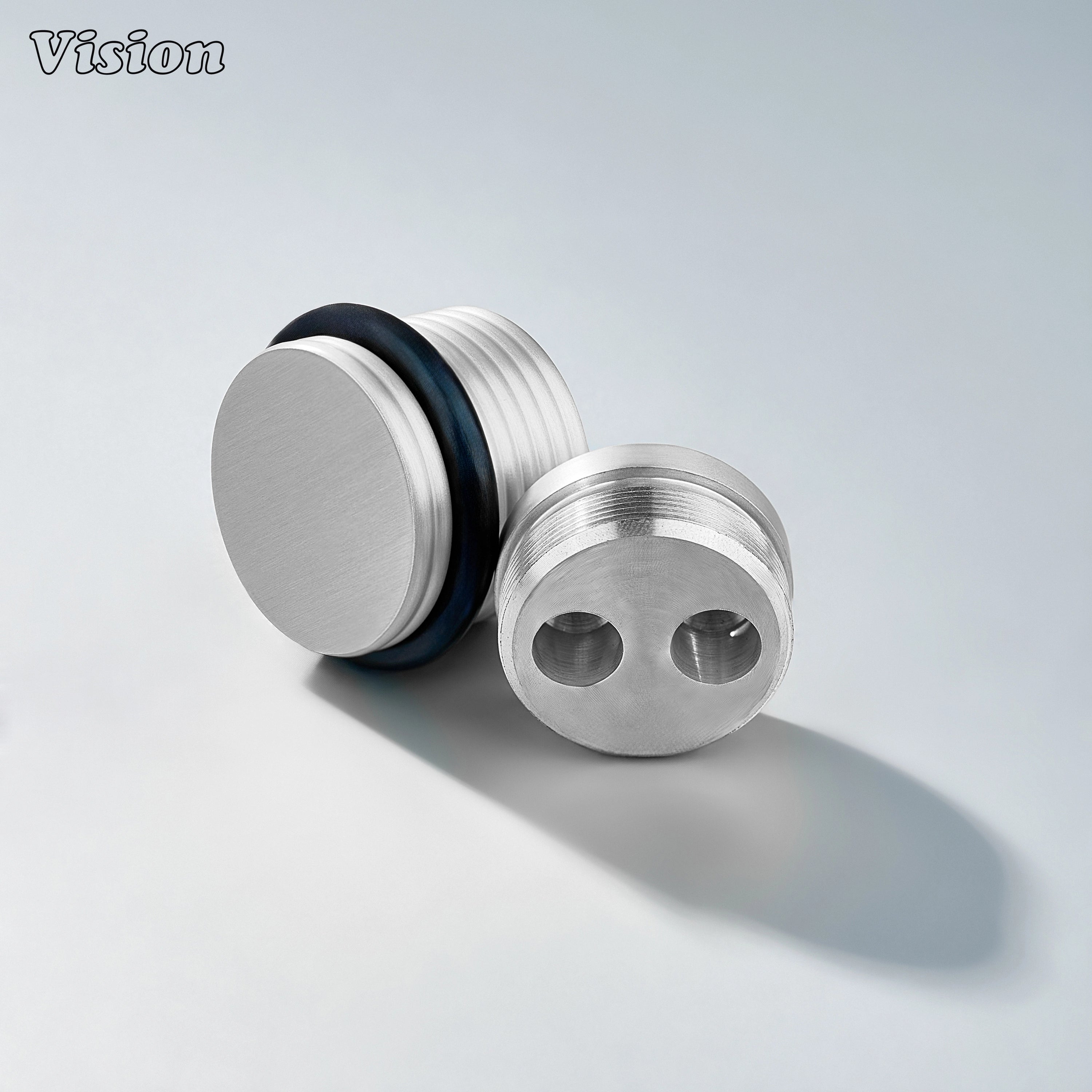 Silver solid brass door stop with ringed texture and round profile for luxury furniture installations