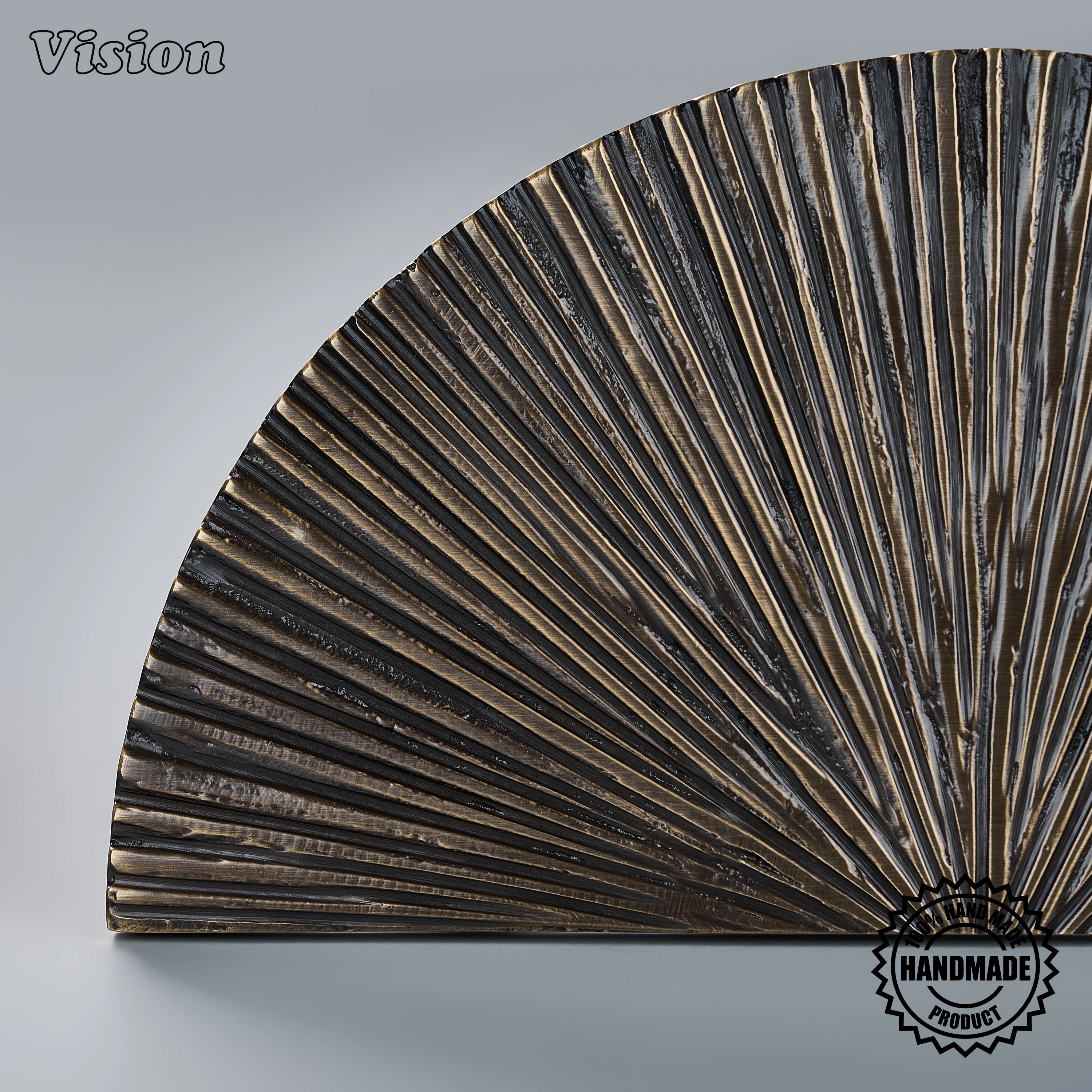 Handcrafted antique bronze door handle with radiating sculpted relief for statement wardrobes