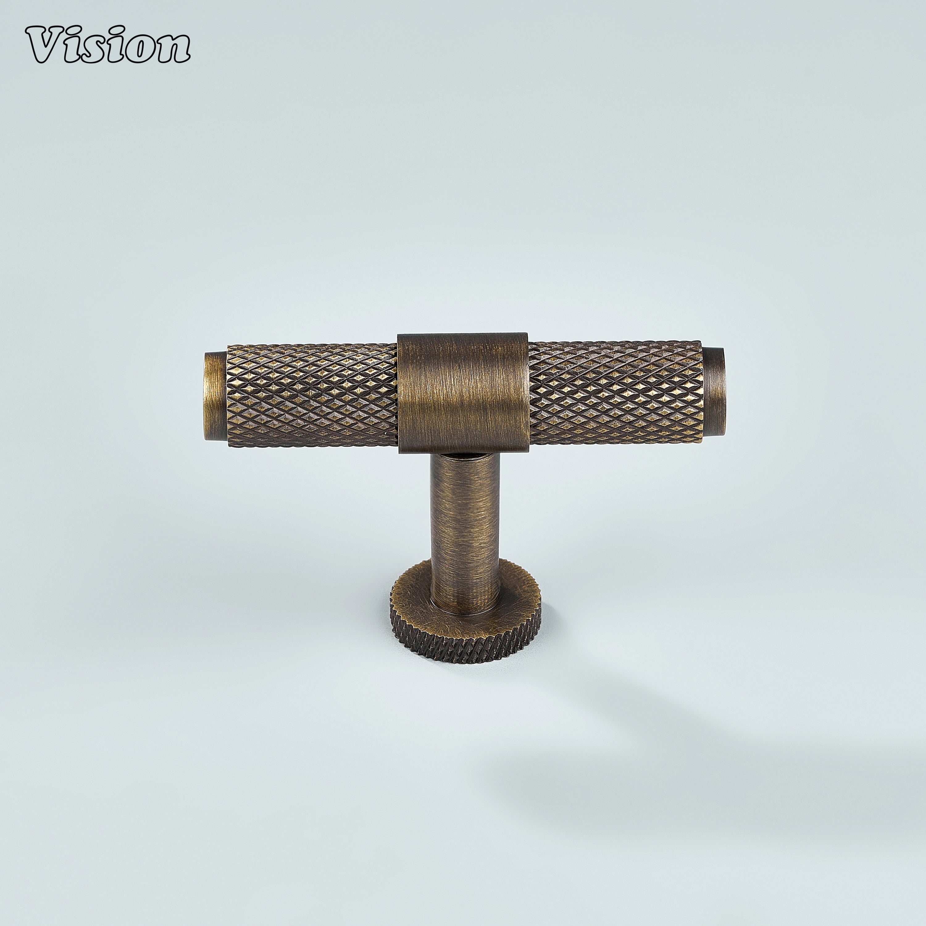Antique bronze knurled T-knob used for wardrobe doors and drawers.