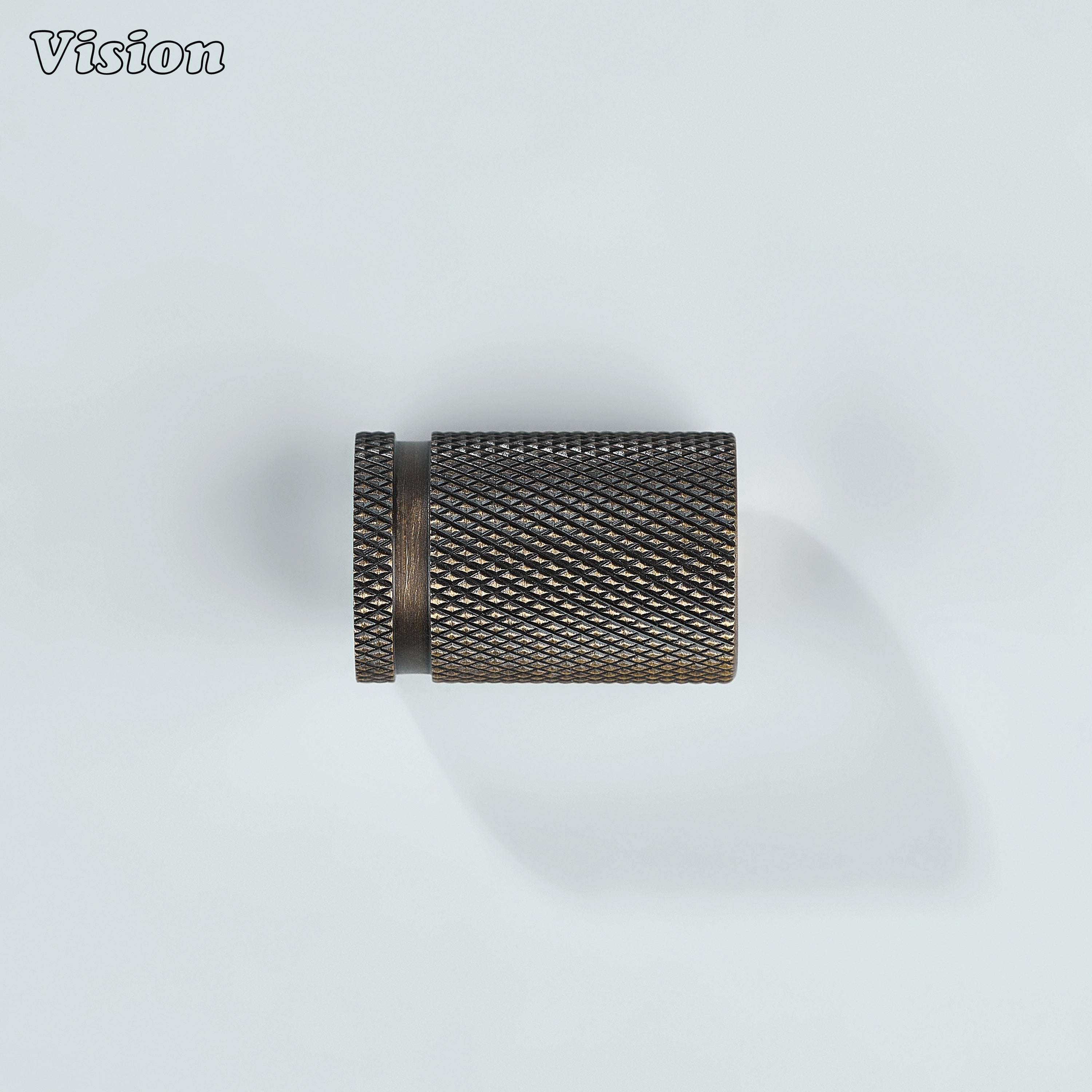 Antique bronze cylinder-shaped cabinet knob with textured grip.