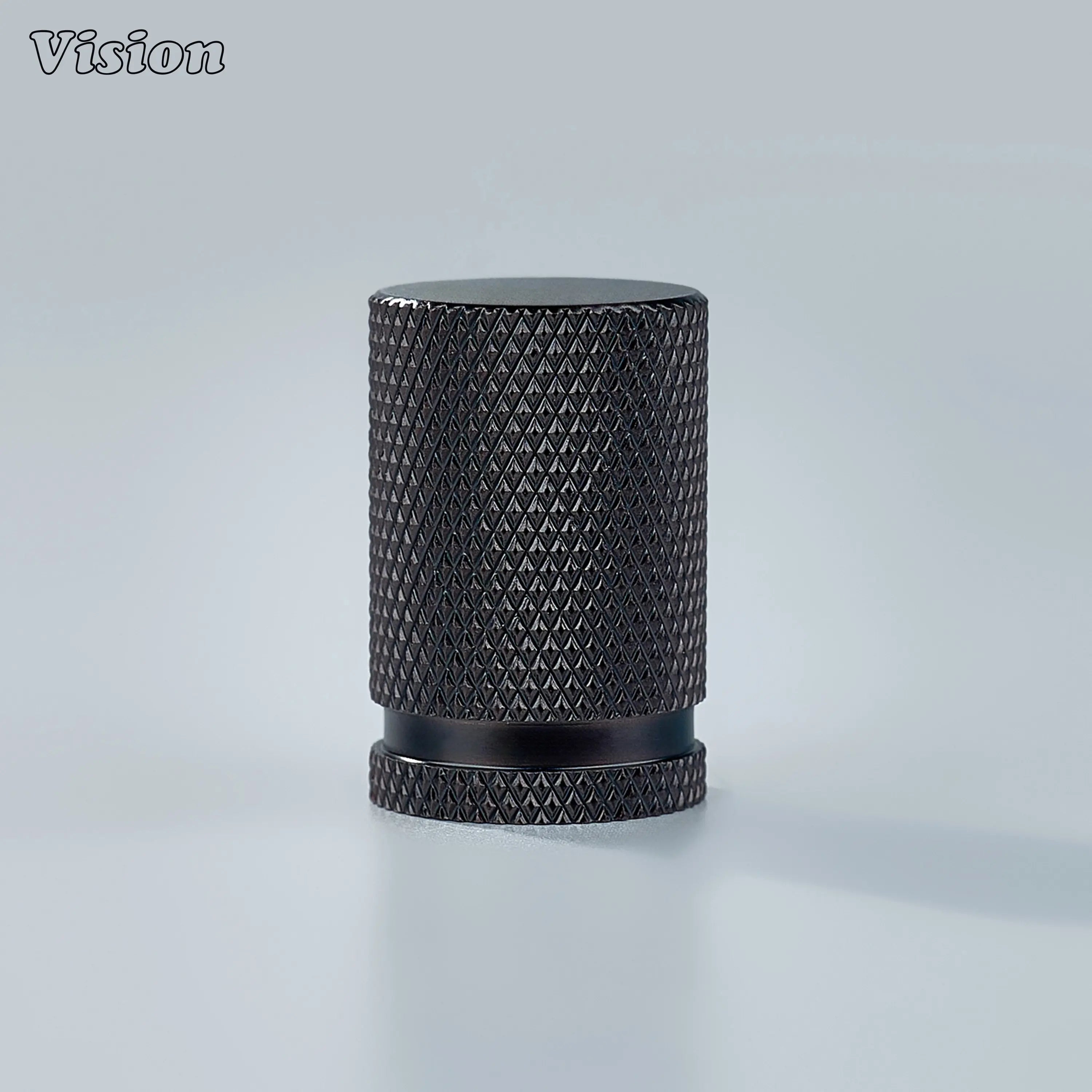 Modern brass knurled cylinder cabinet knob in bronze finish used for wardrobe doors.